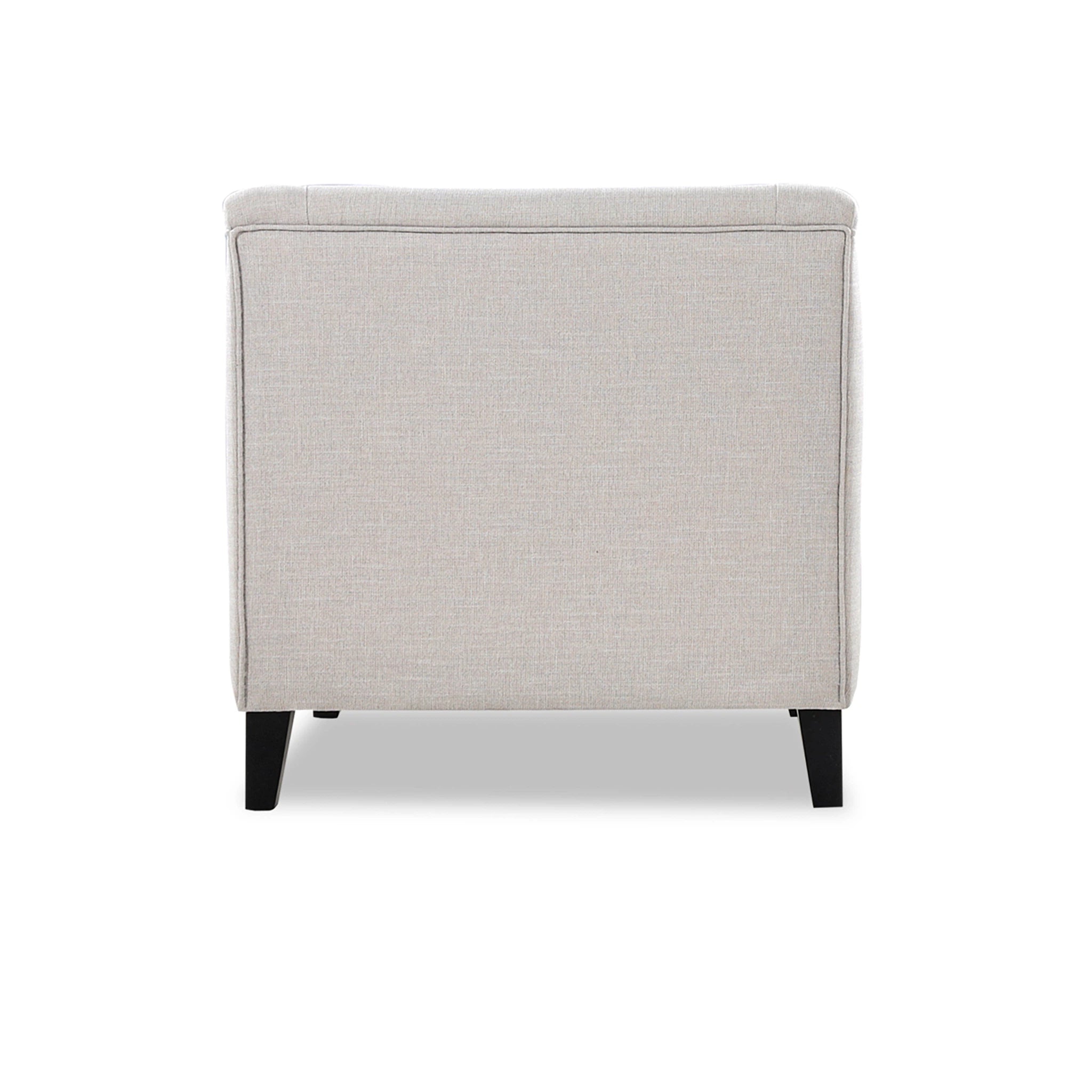 Beige armchair with black legs on a white background