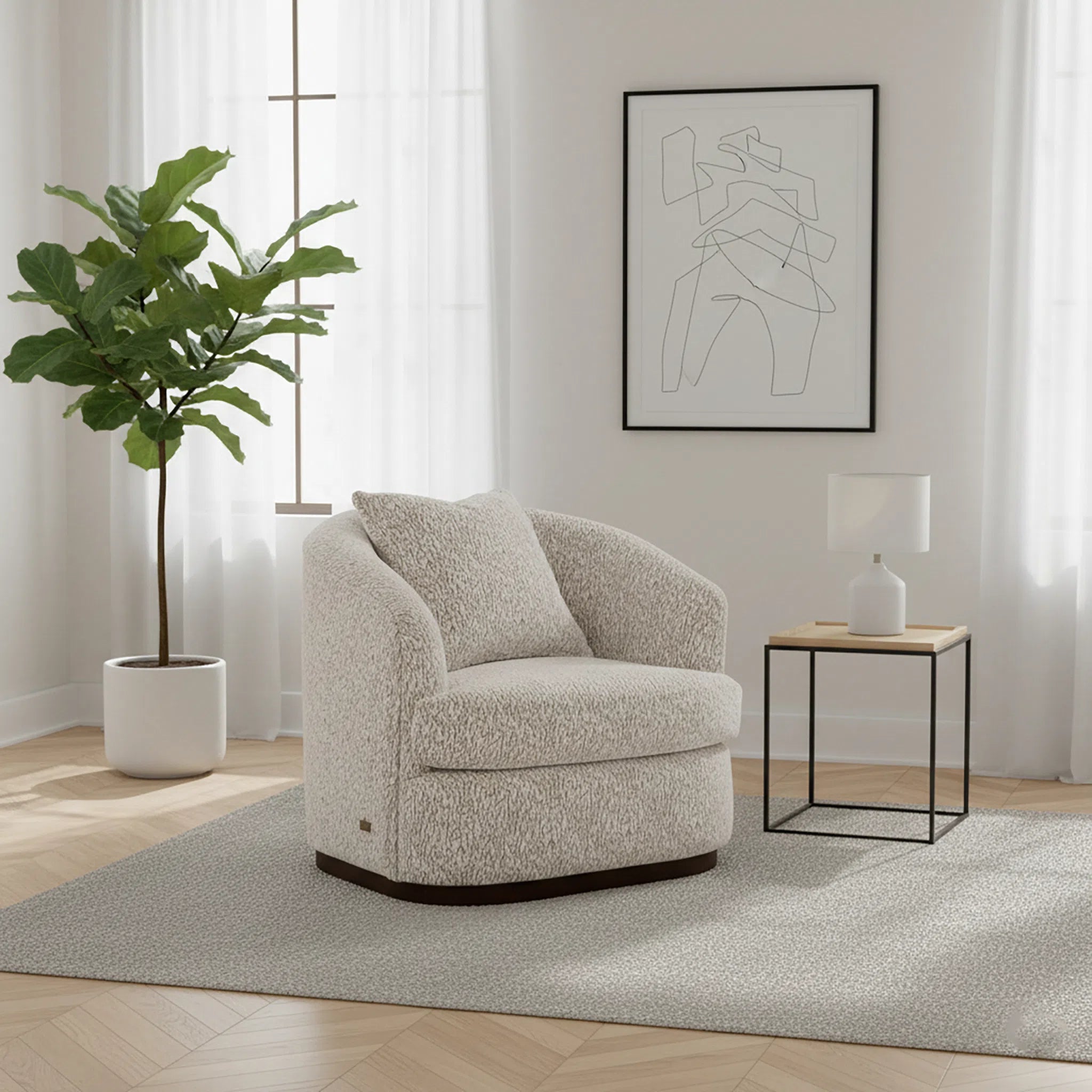 Beige armchair in a modern living room with a plant and side table.