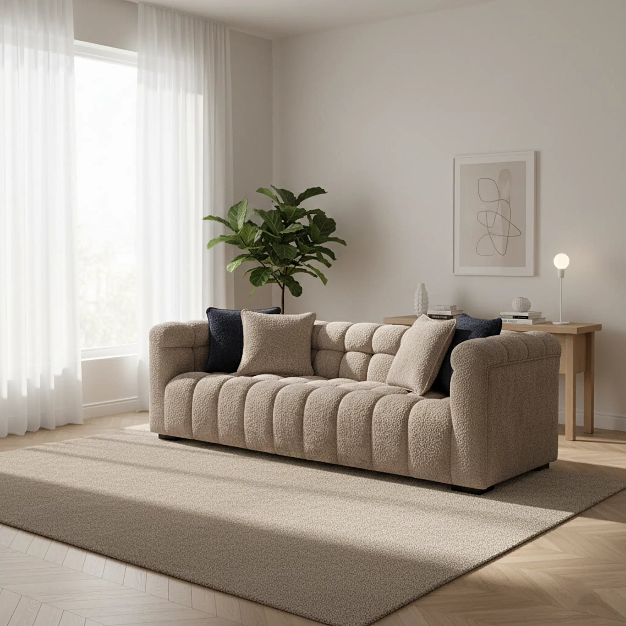 Beige sofa in a modern living room with a plant and decor items.
