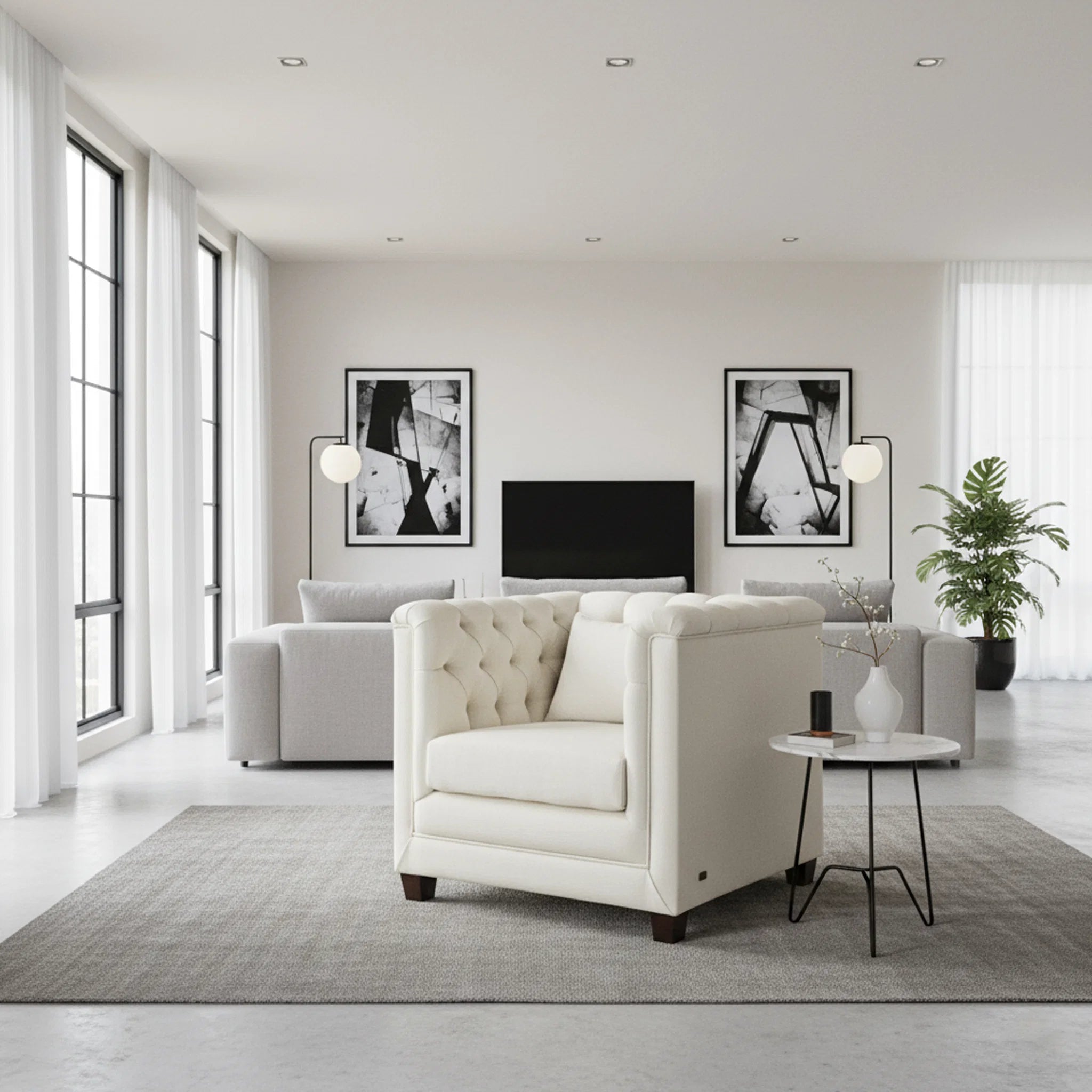 Modern living room with white armchair, sofa, and decorative elements.