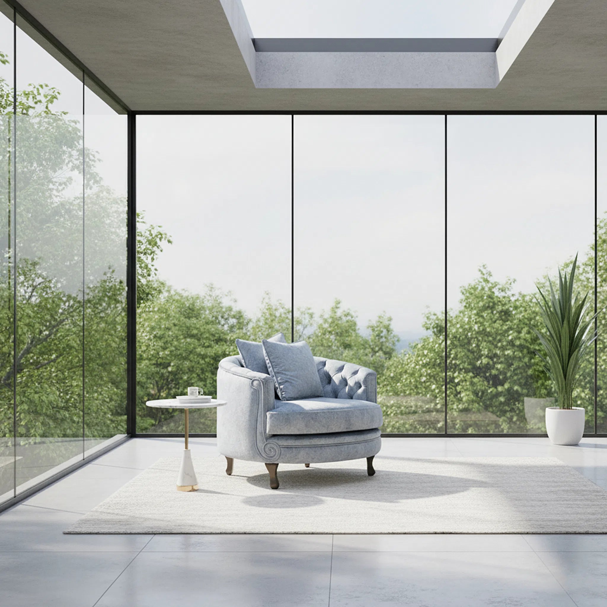 Modern living room with a gray armchair and large windows overlooking greenery