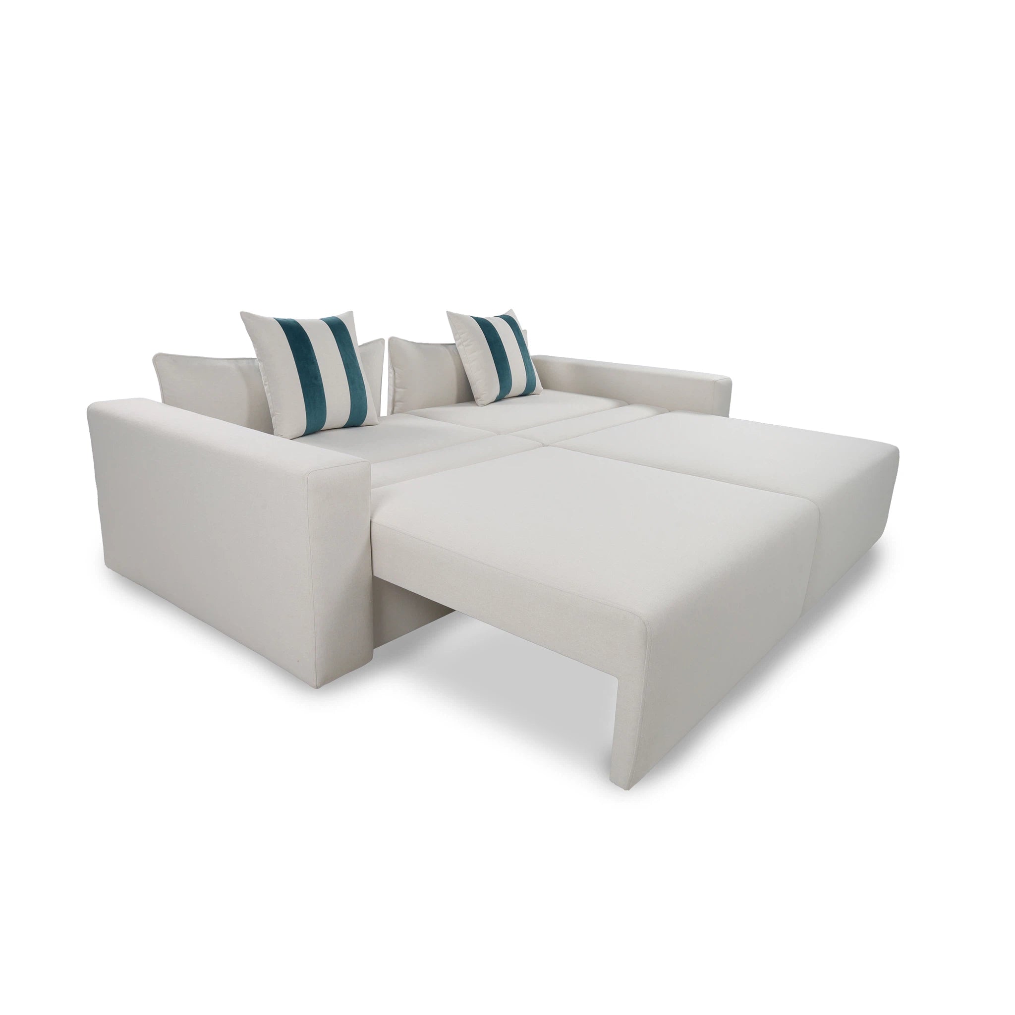 White sectional sofa with striped cushions on a white background
