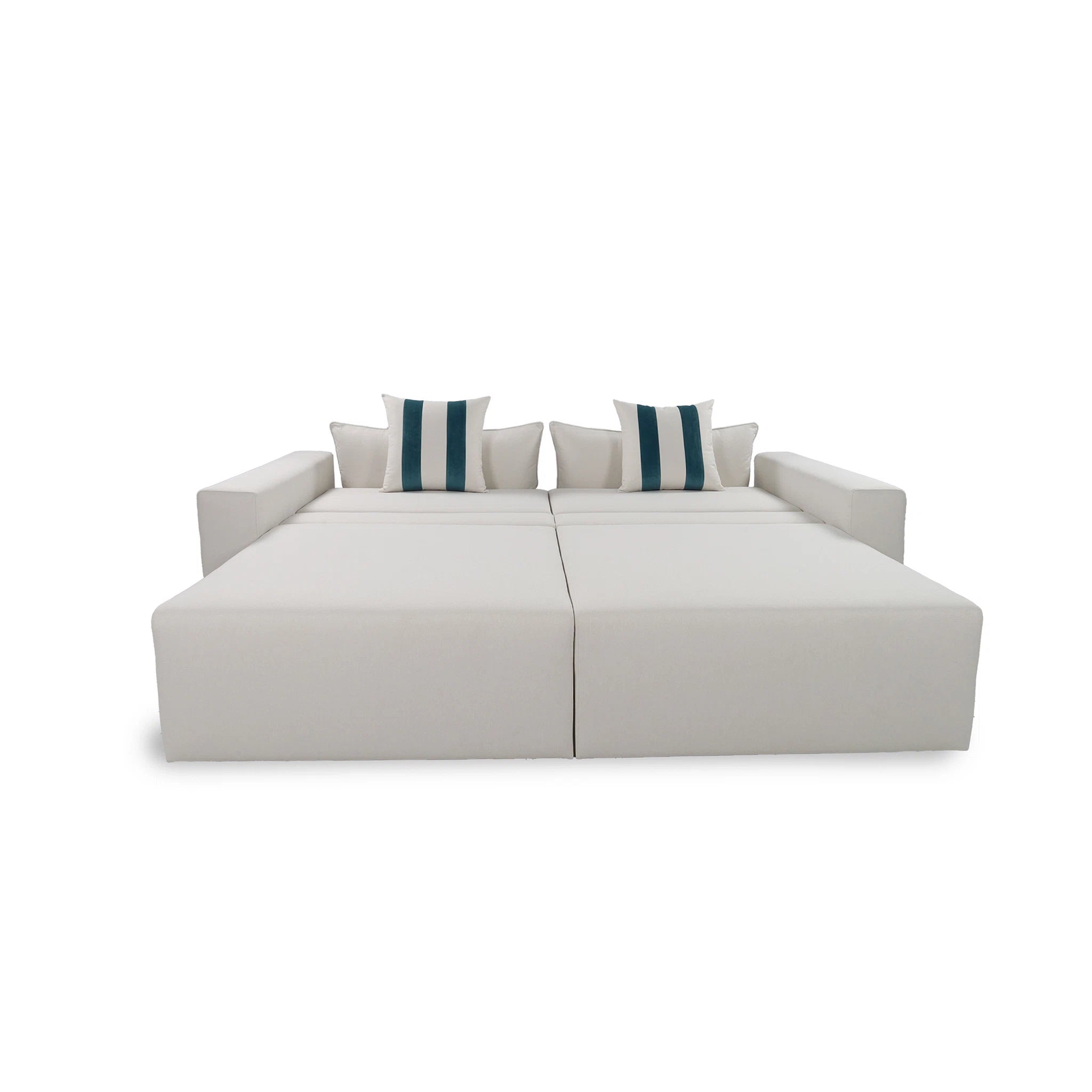White sectional sofa with striped cushions on a white background