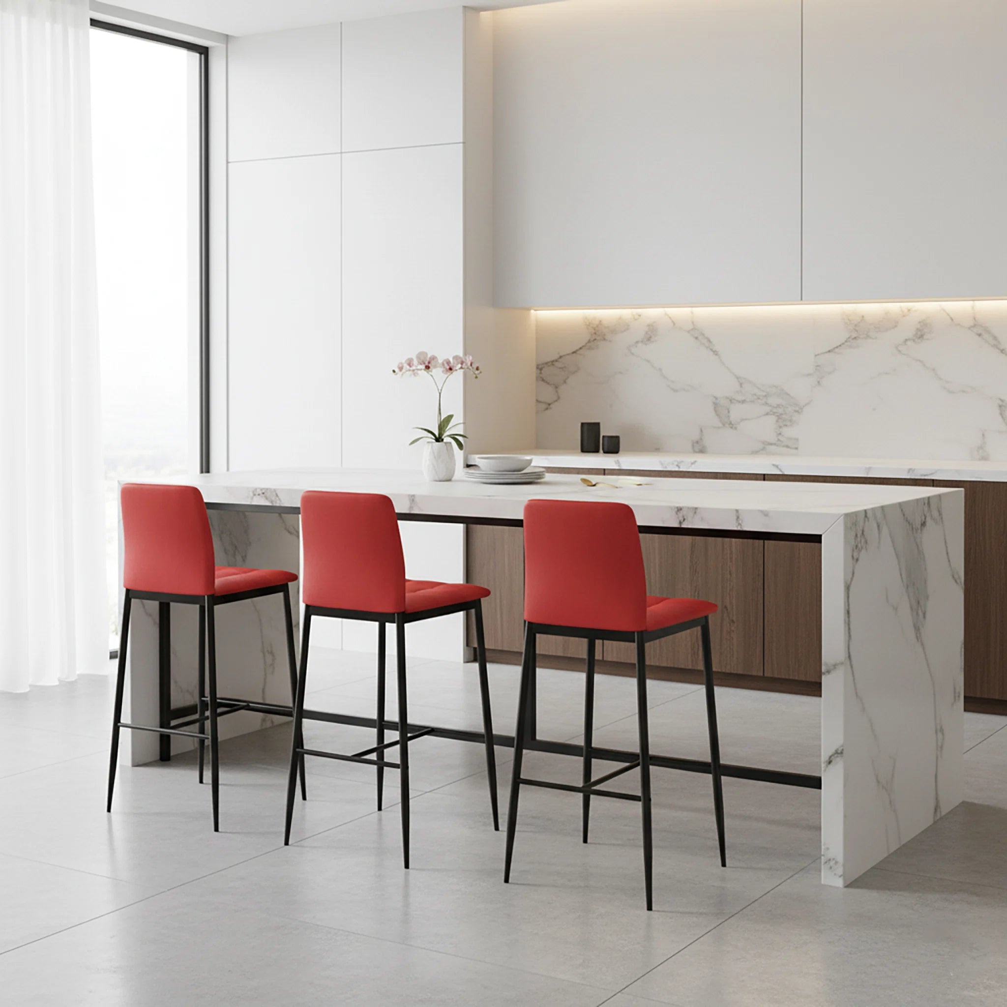 Modern kitchen with marble island and red bar stools