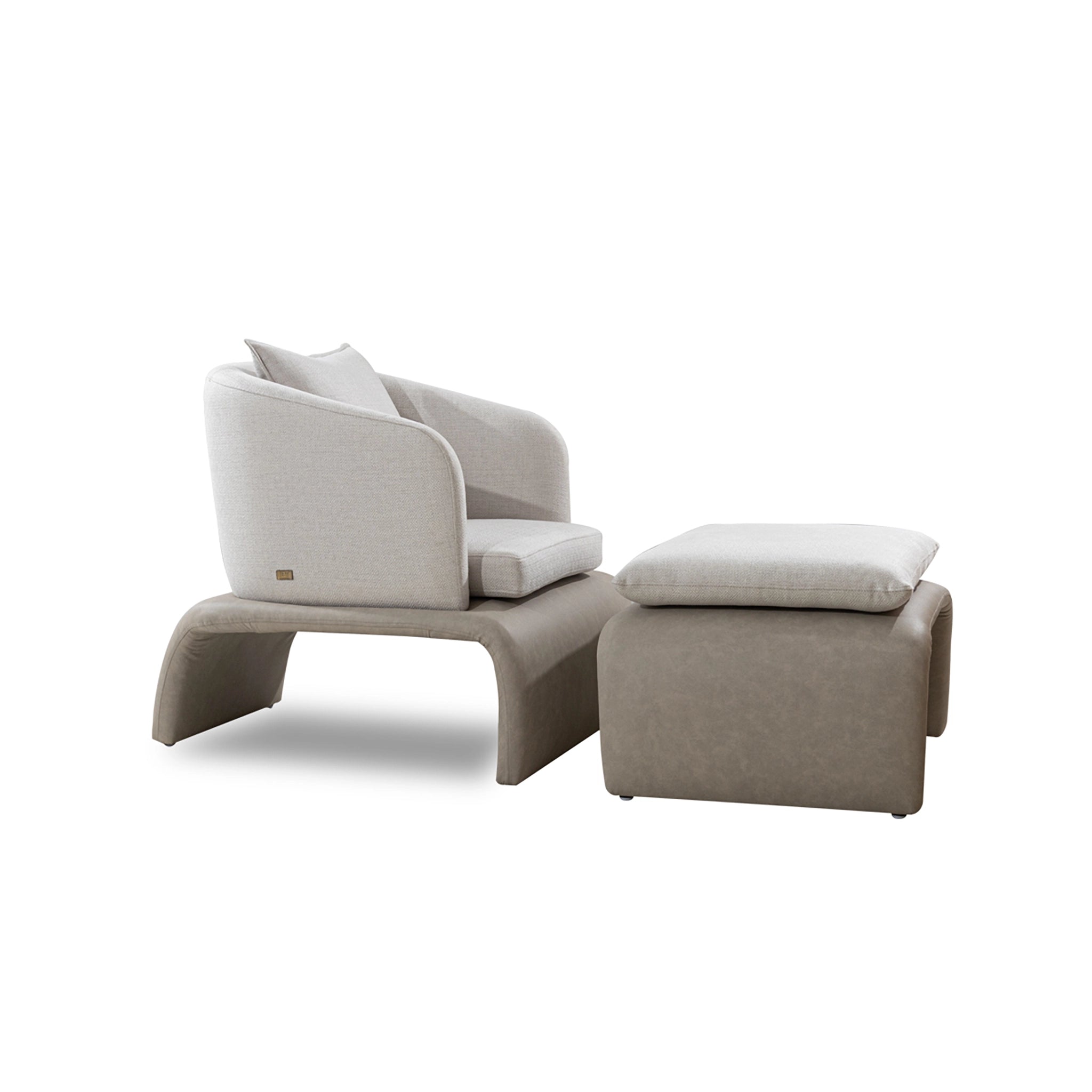 Modern armchair with ottoman on a white background