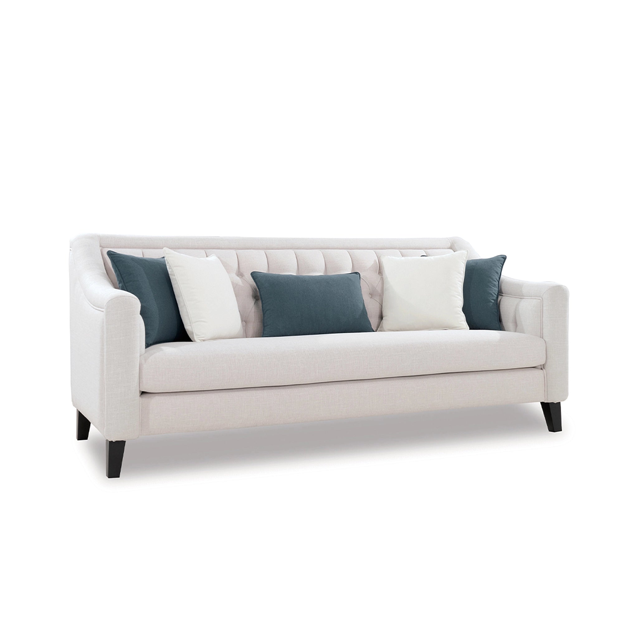 White sofa with blue and white cushions on a white background