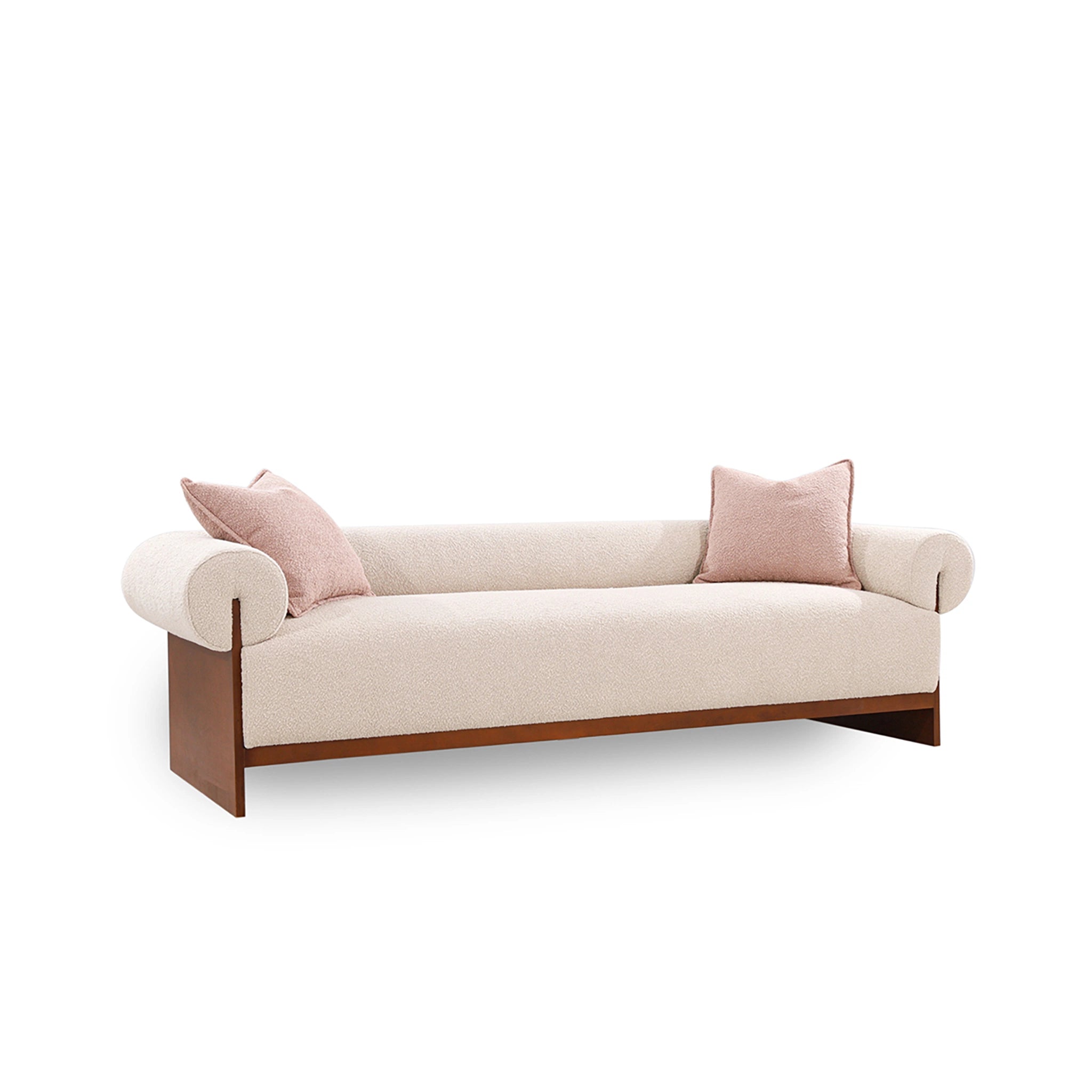 Beige sofa with wooden legs and pink cushions on a white background