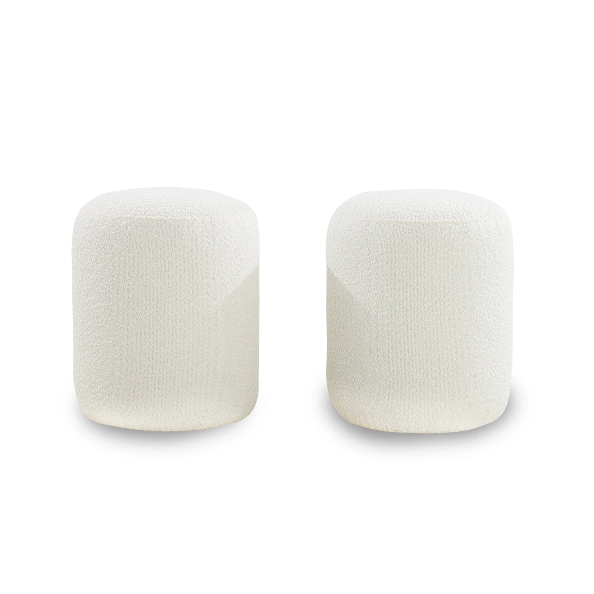 Two cylindrical white objects on a white background