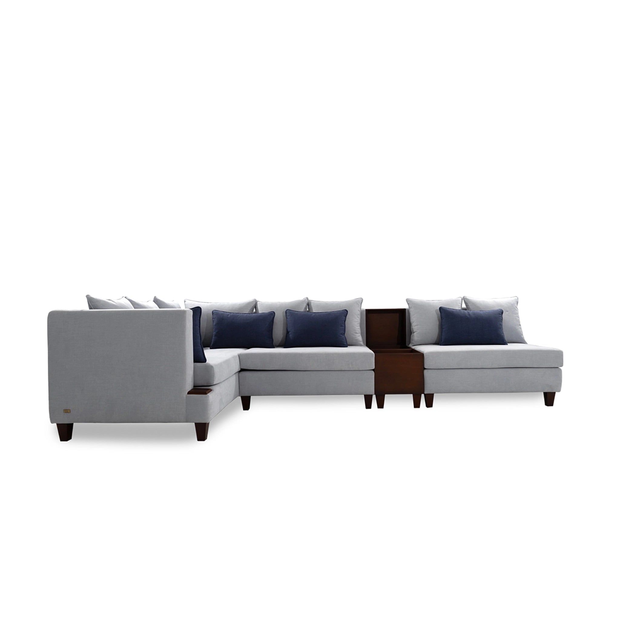 Gray sectional sofa with blue cushions on a white background