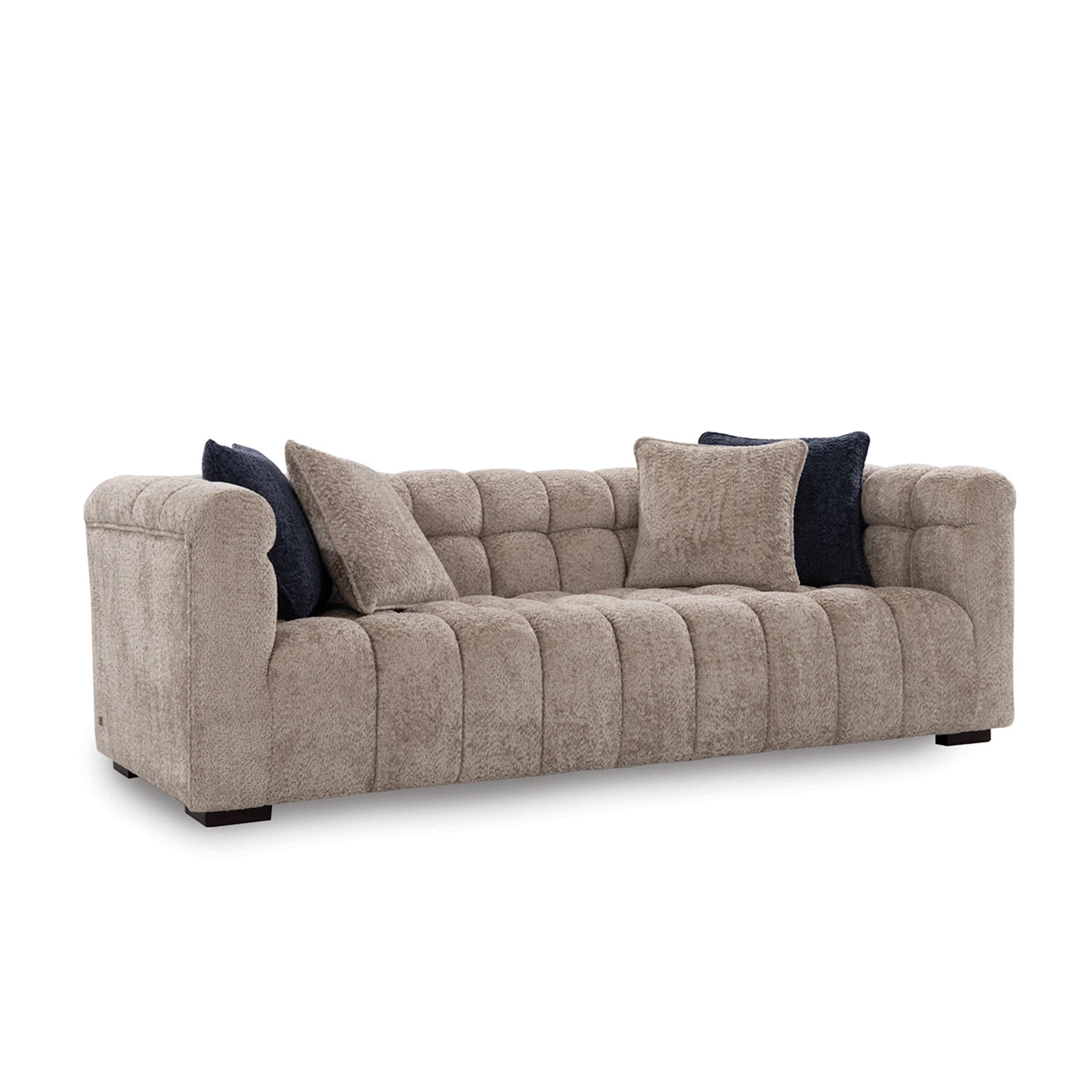 Beige sofa with decorative pillows on a white background