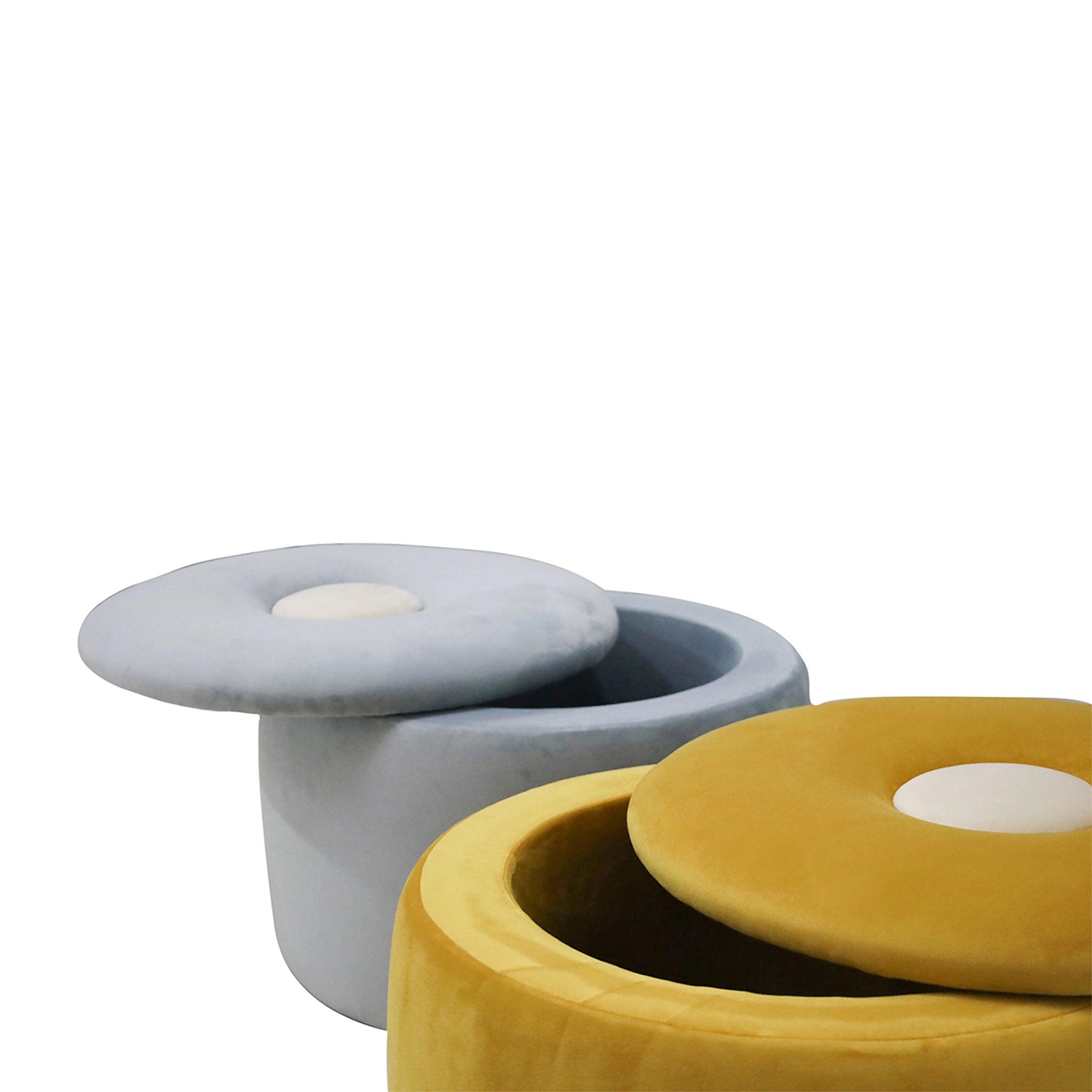 Two round ottomans, one gray and one yellow, on a white background