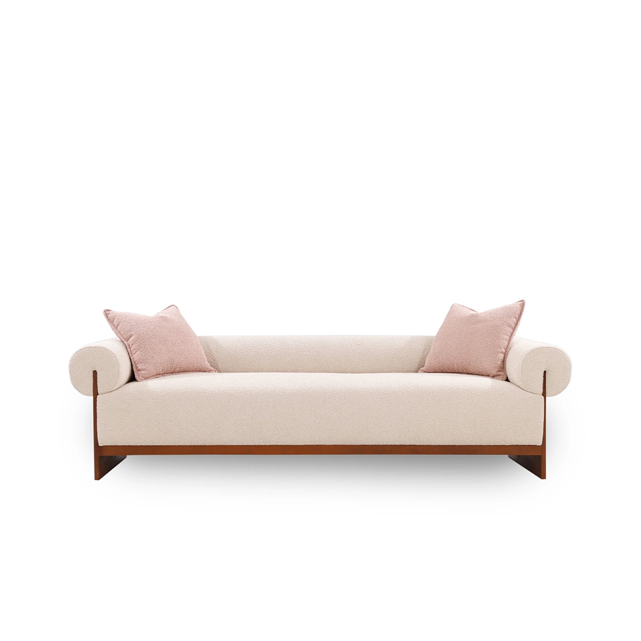 Beige sofa with pink cushions on a white background