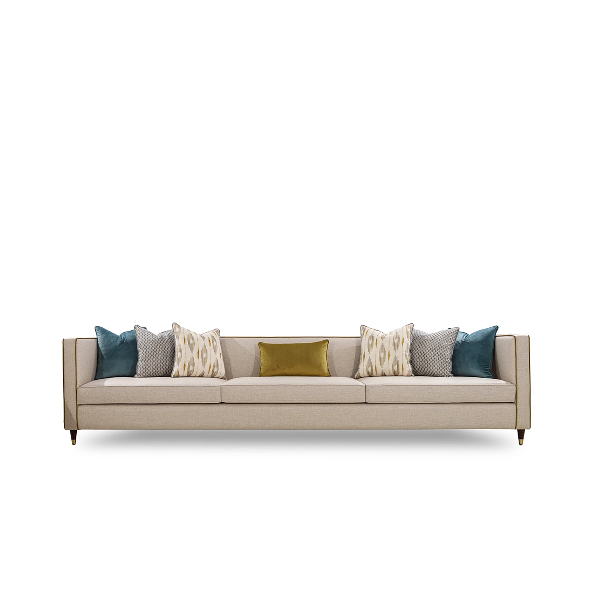 Beige sofa with decorative pillows on a white background