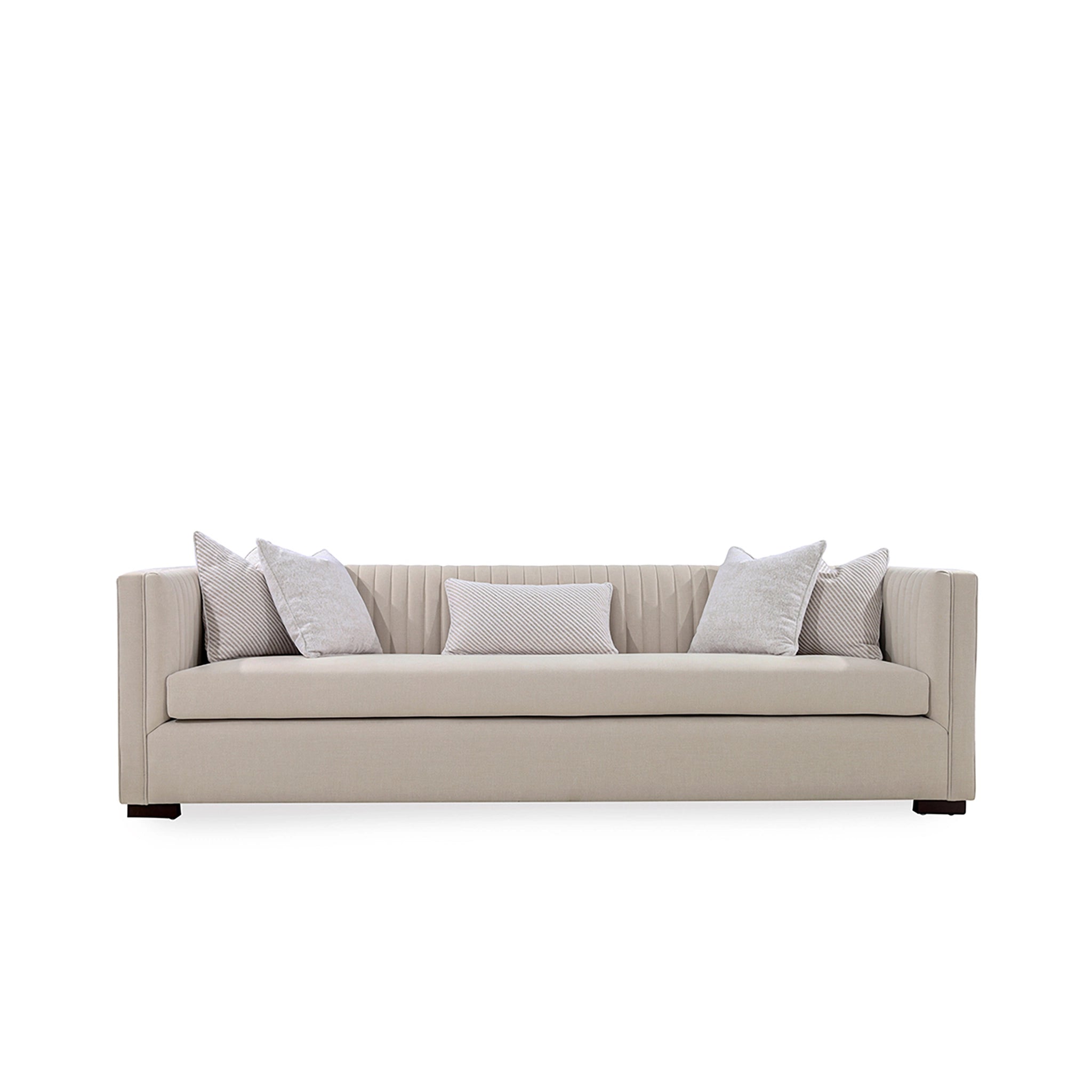 Beige sofa with decorative pillows on a white background