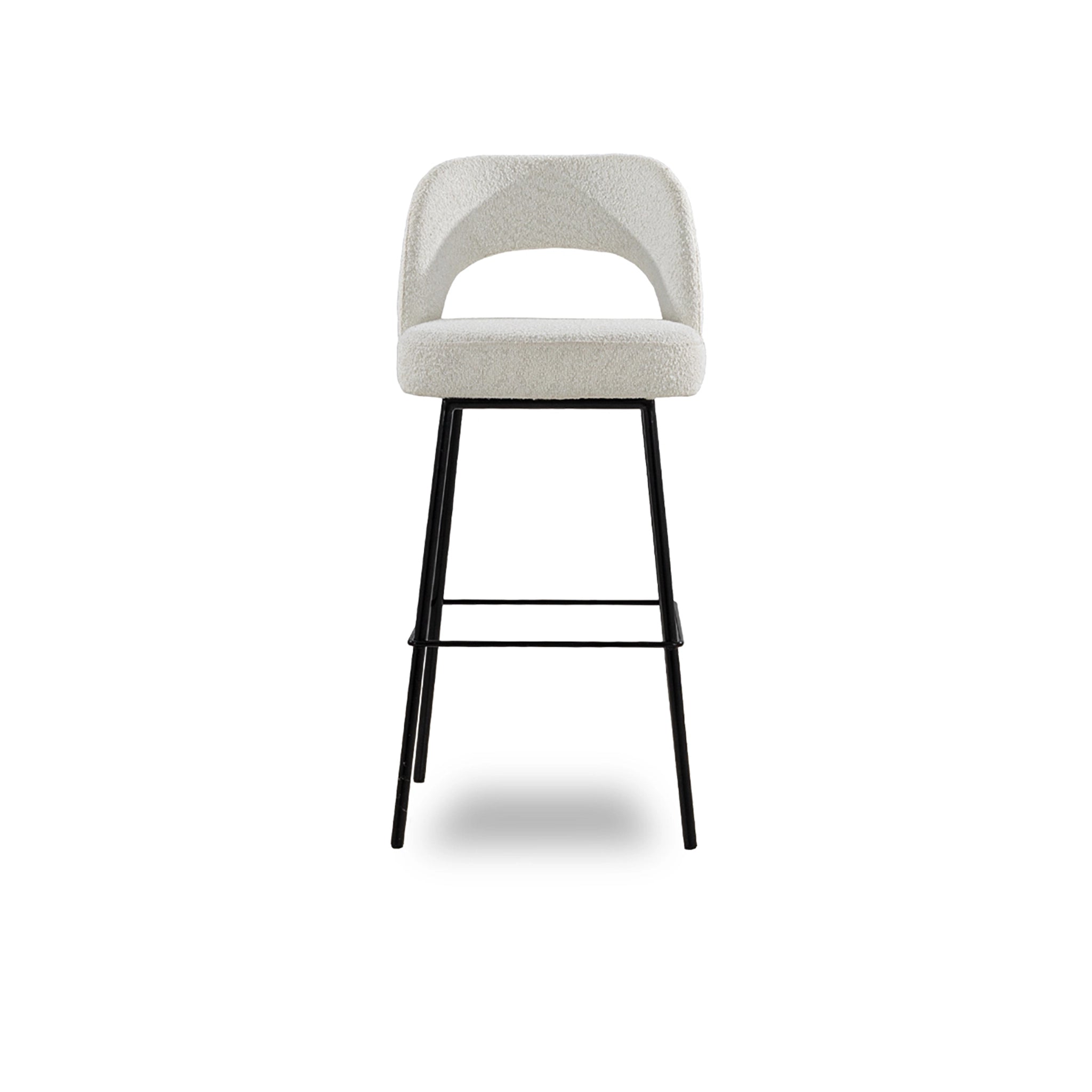 Bar stool with a white seat and black metal legs on a white background
