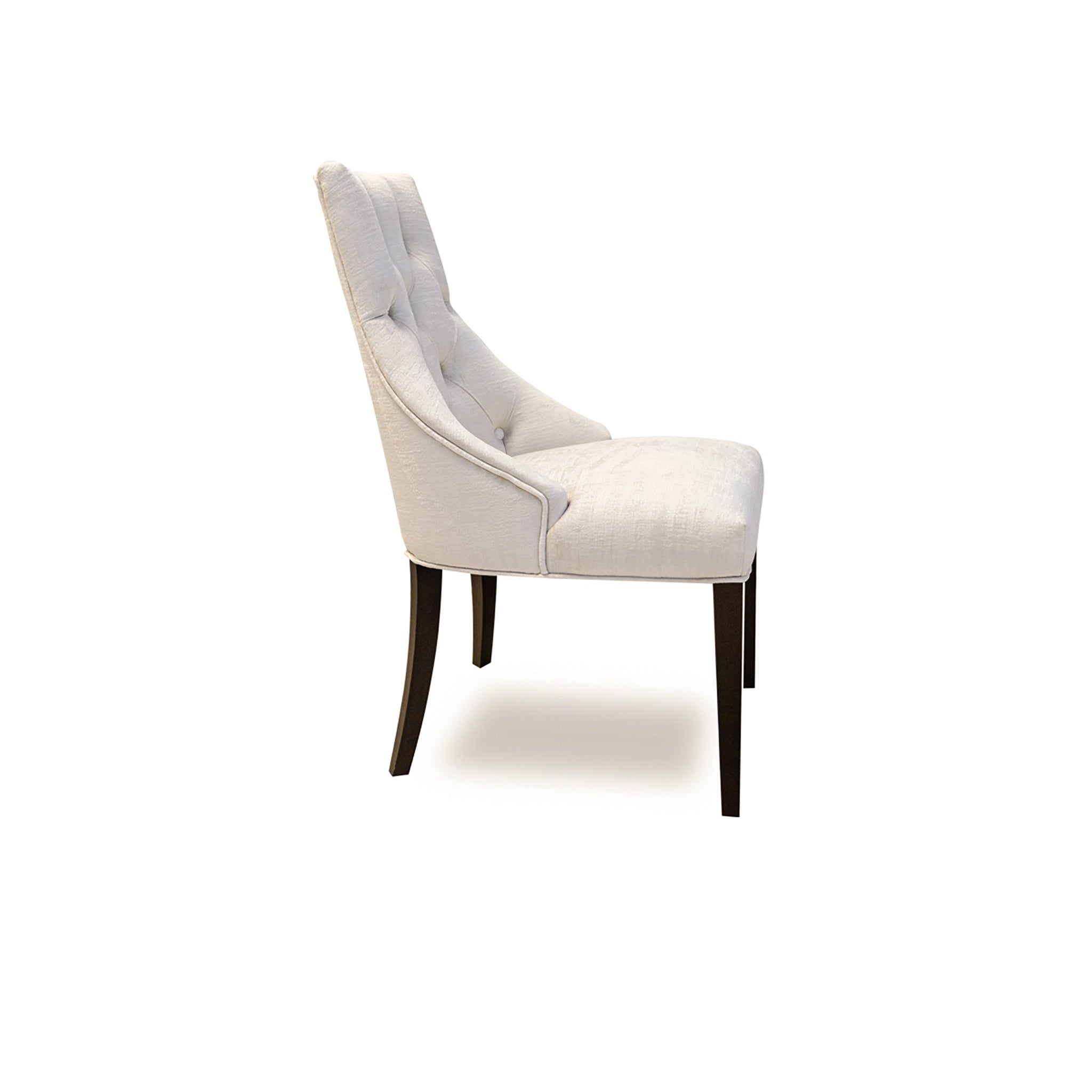 White upholstered chair with dark wood legs on a white background