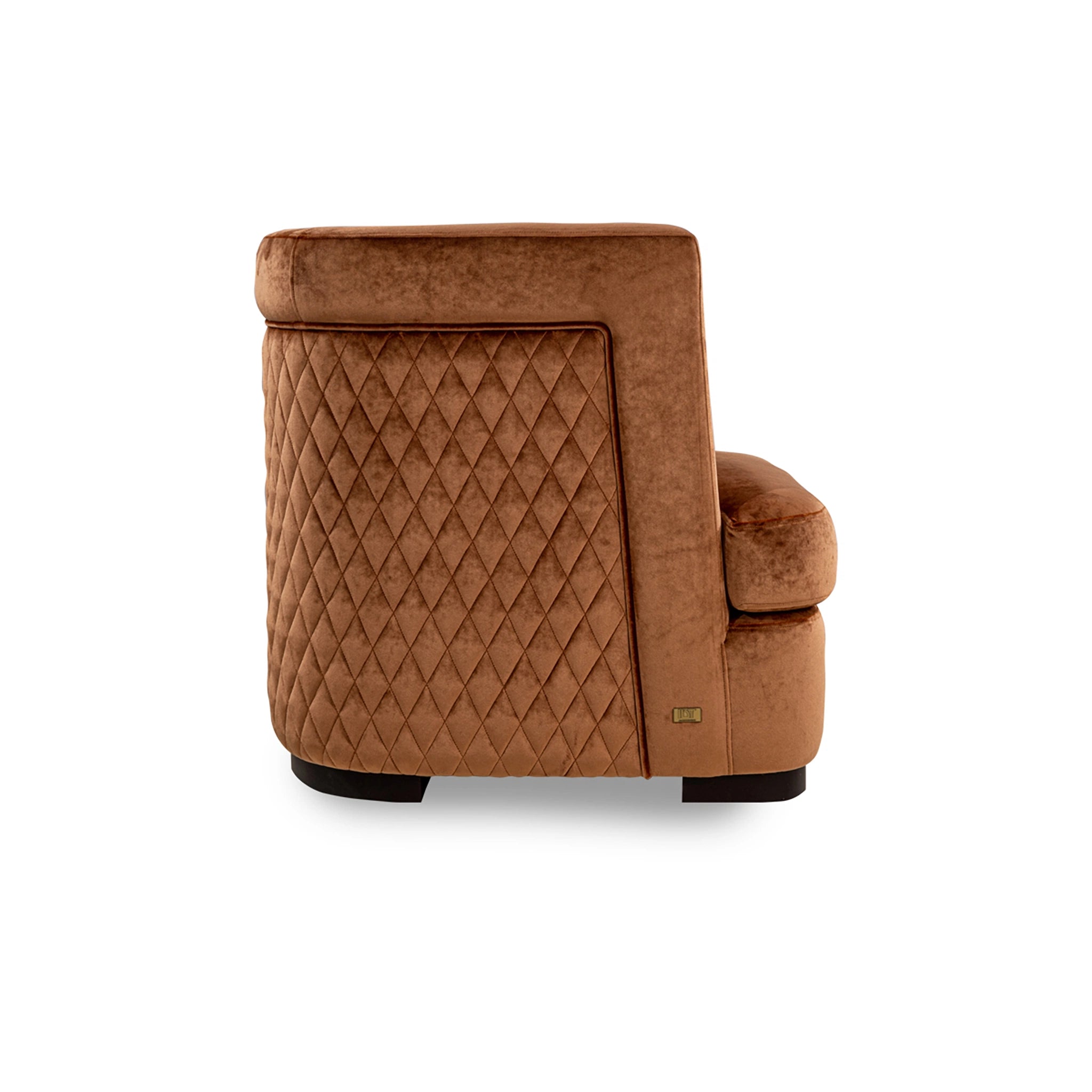 Brown armchair with quilted pattern on a white background
