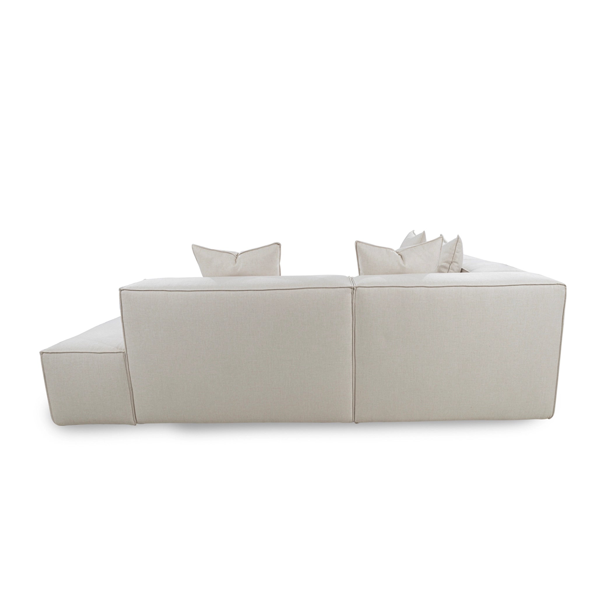 Light gray sectional sofa with two cushions on a white background