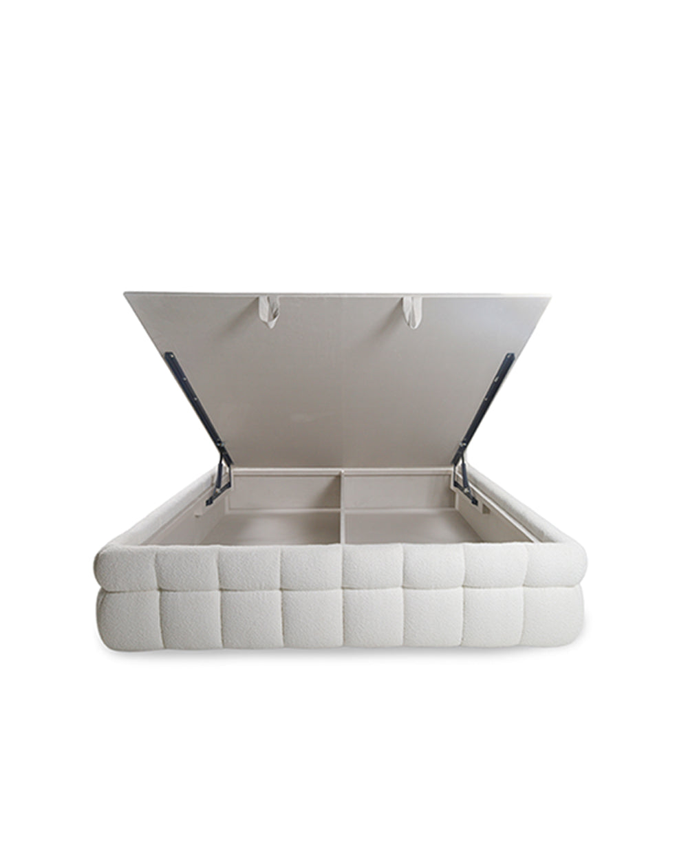 White upholstered bed with open headboard on a white background