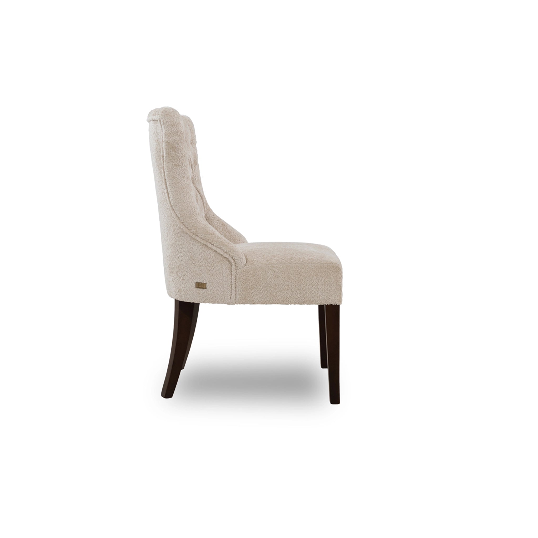 Beige upholstered chair with dark wood legs on a white background