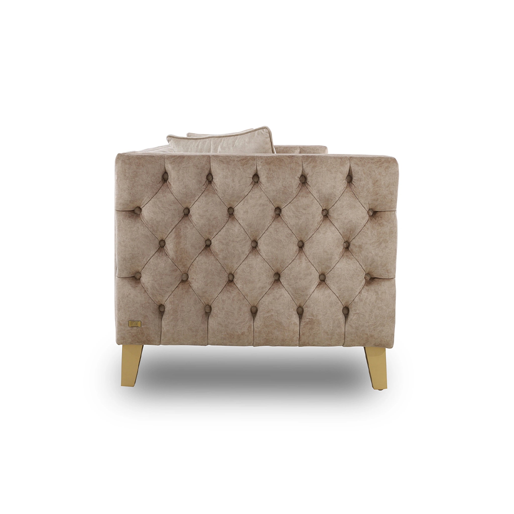 Beige armchair with tufted backrest on a white background