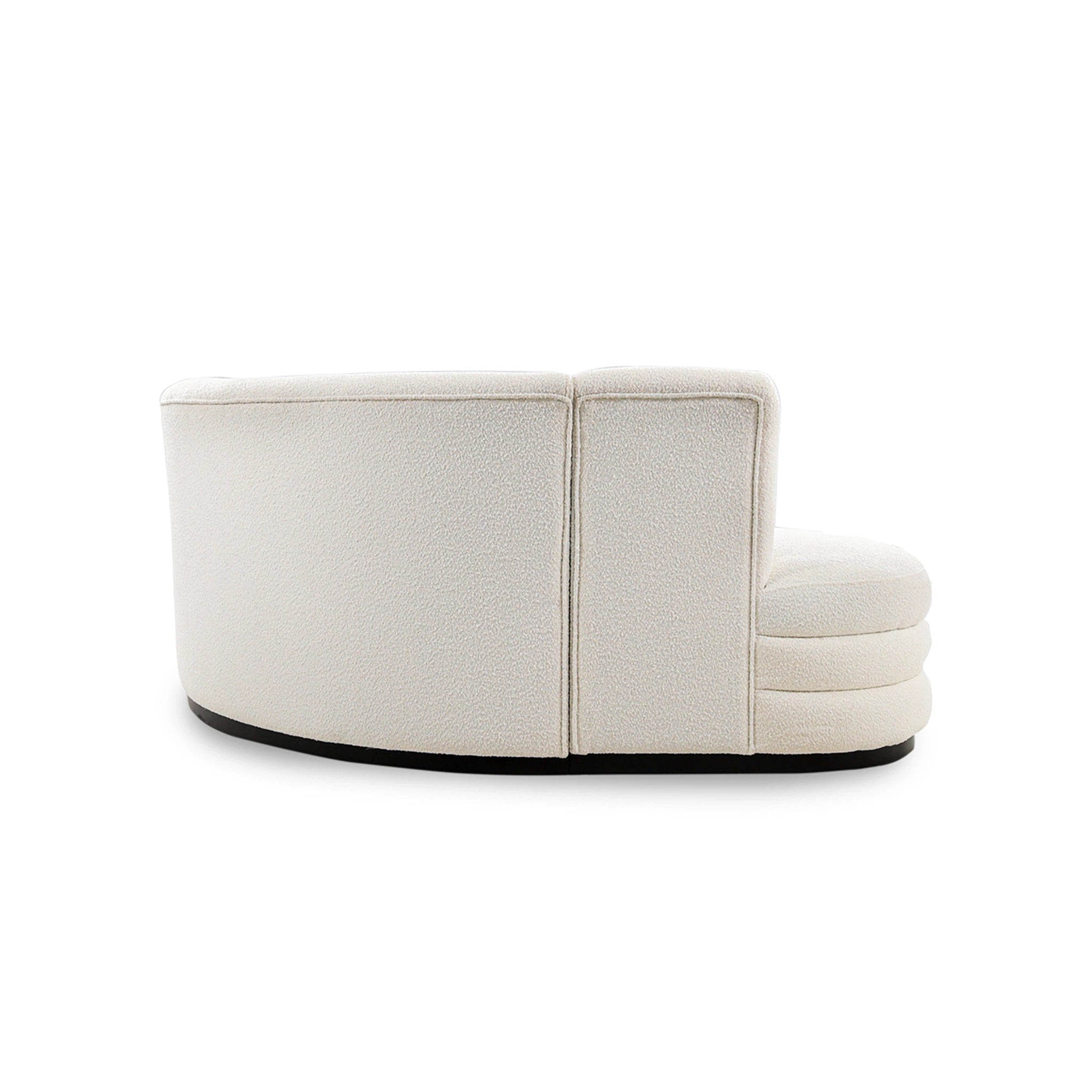 White upholstered chair with a black base on a white background
