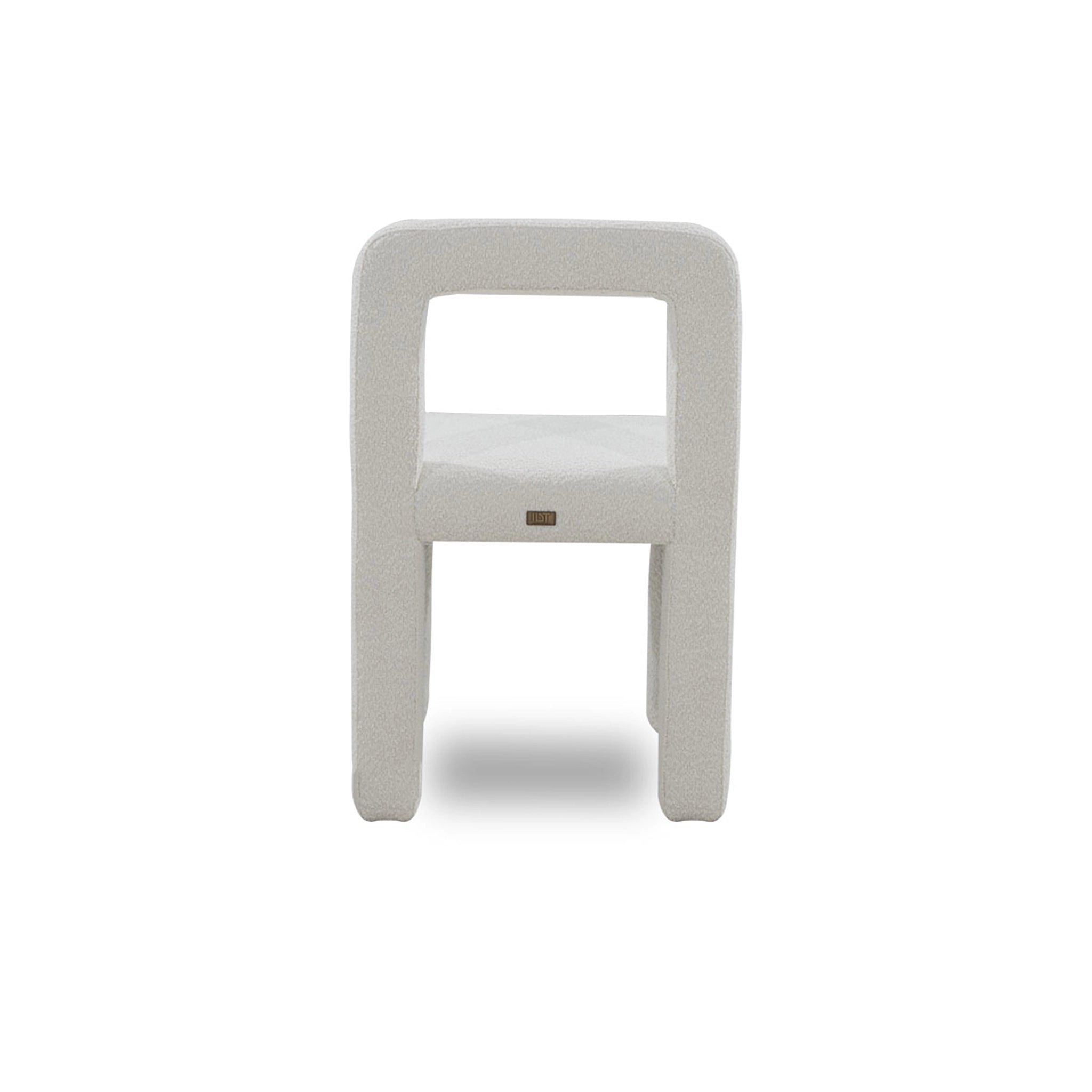 White chair with a small logo on a white background