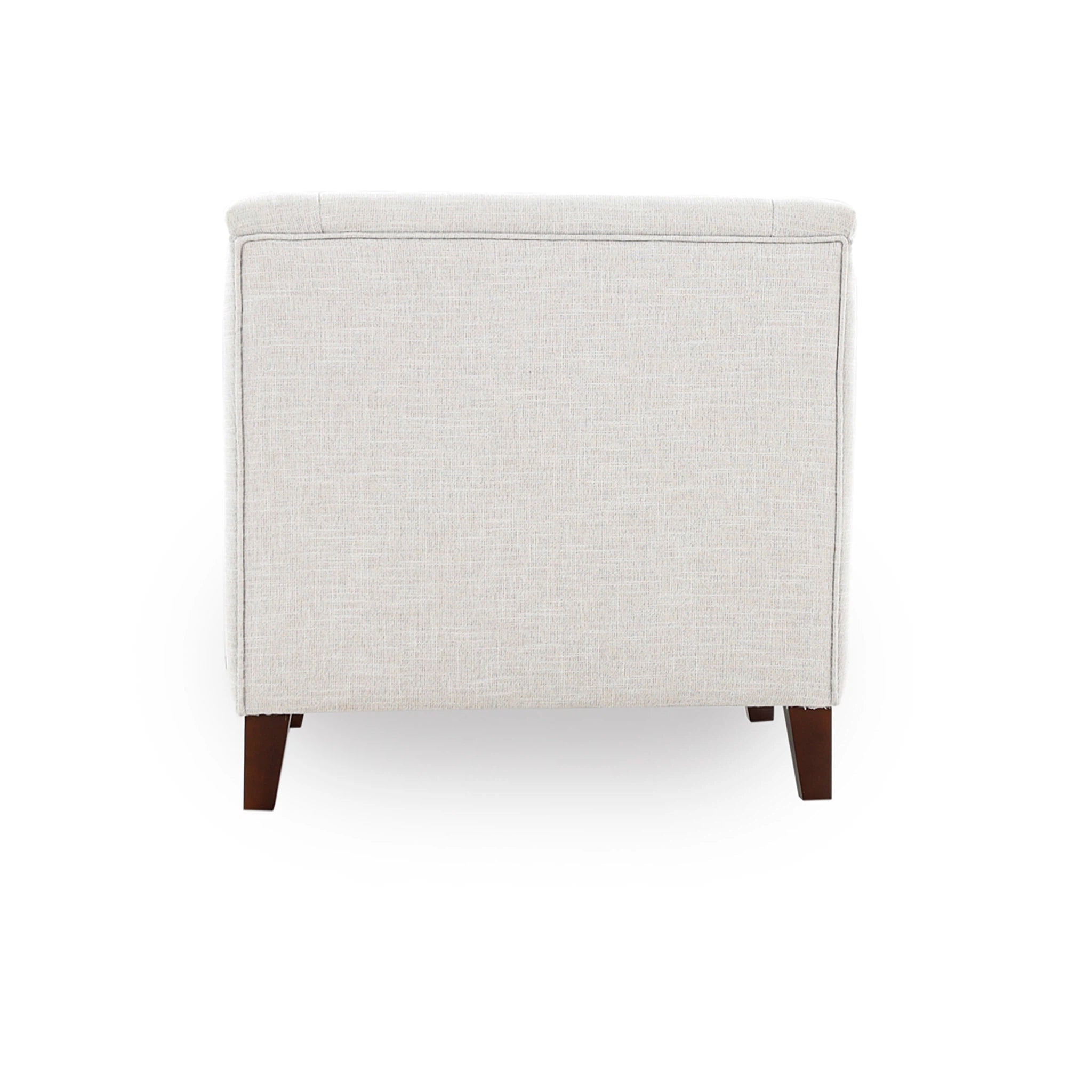 White upholstered ottoman with wooden legs on a white background
