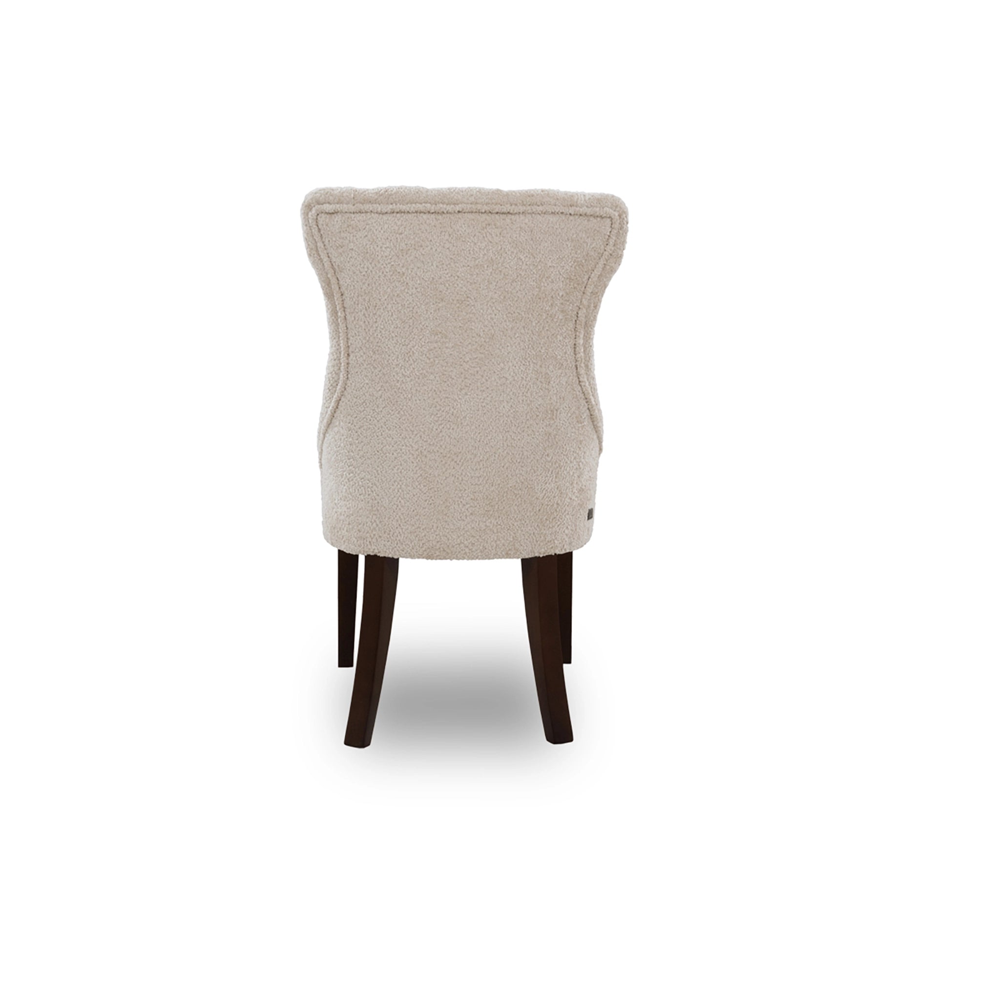 Beige upholstered chair with dark wooden legs on a white background