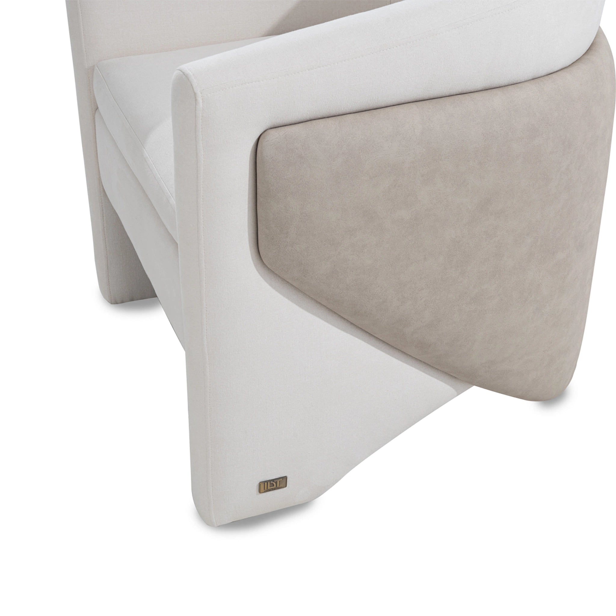 Close-up of a modern chair with a white frame and beige cushion on a white background