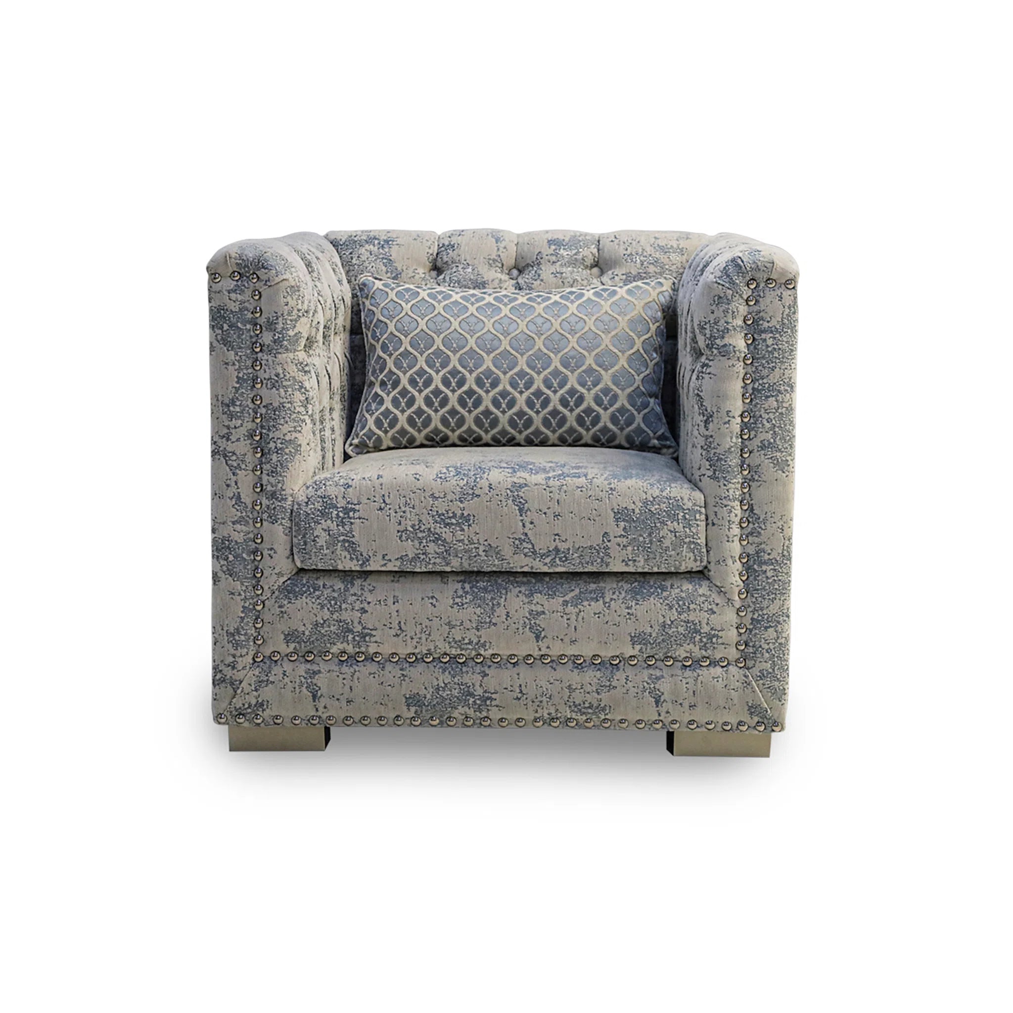 Patterned armchair with a decorative pillow on a white background
