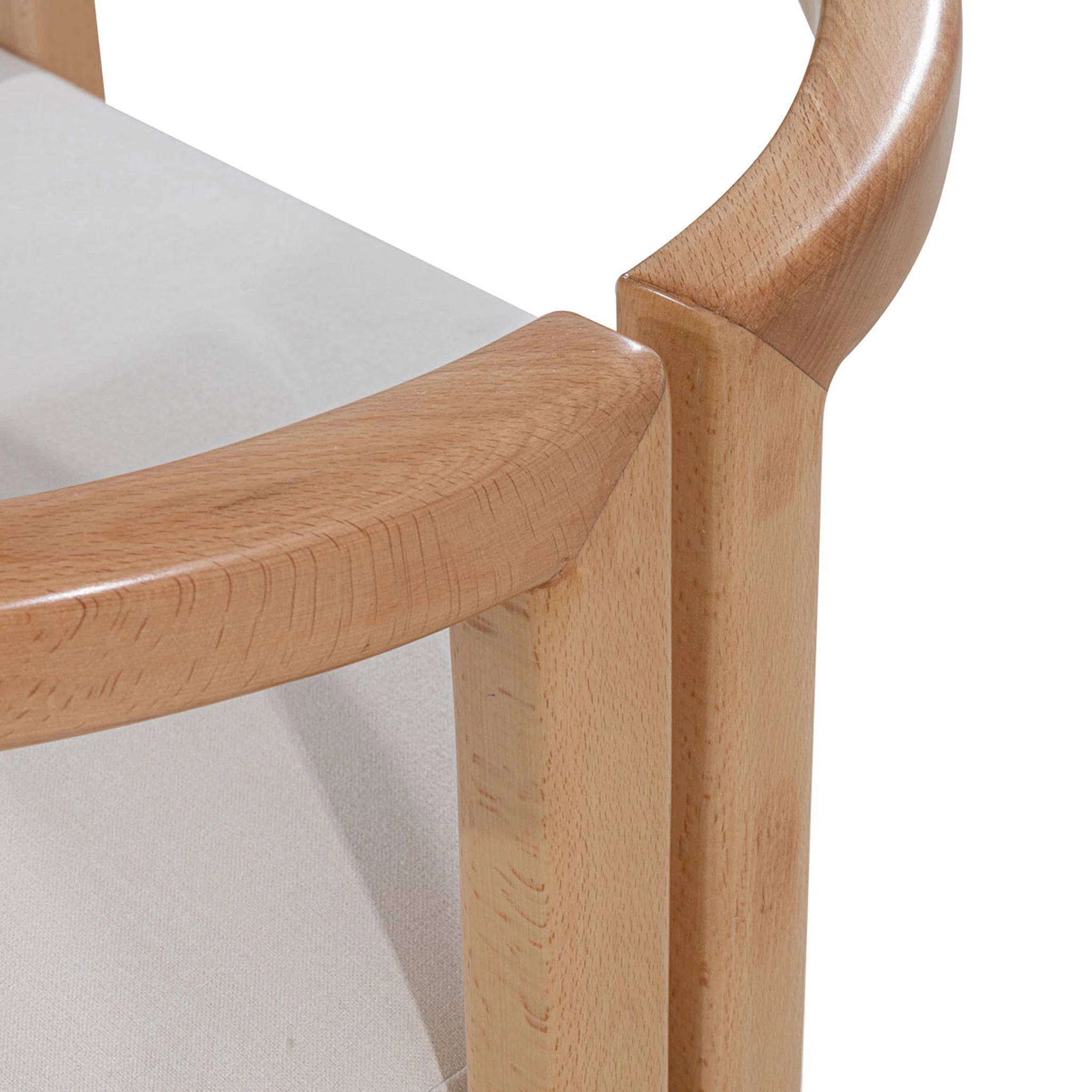 Close-up of a wooden chair with a white cushion on a white background
