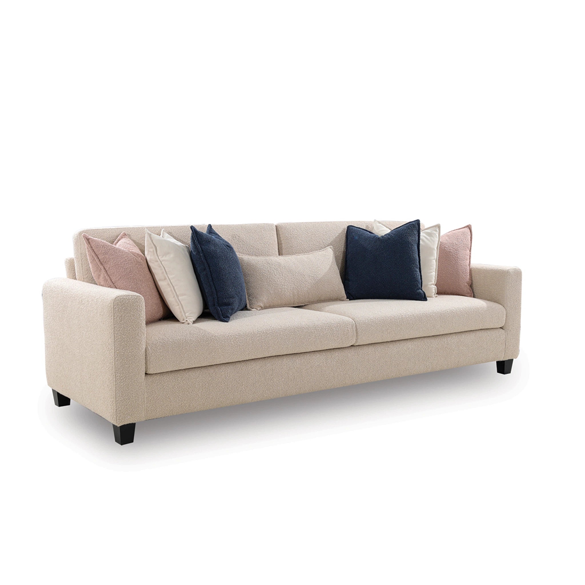 Beige sofa with decorative pillows on a white background