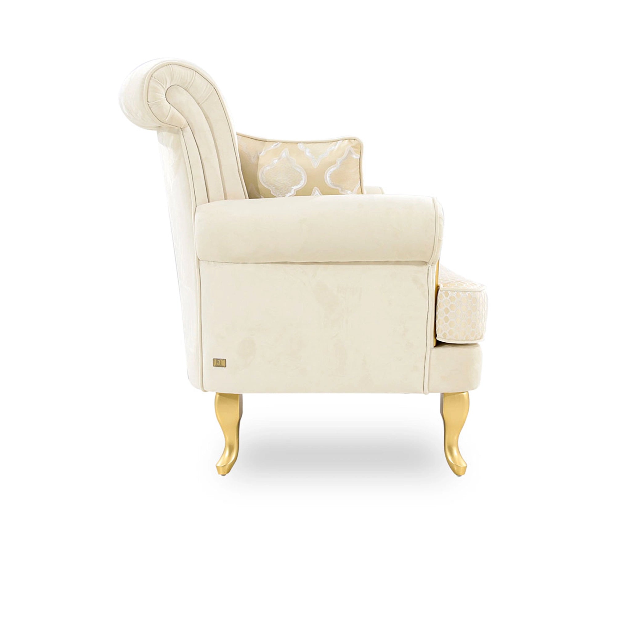 Cream-colored armchair with a decorative pillow on a white background