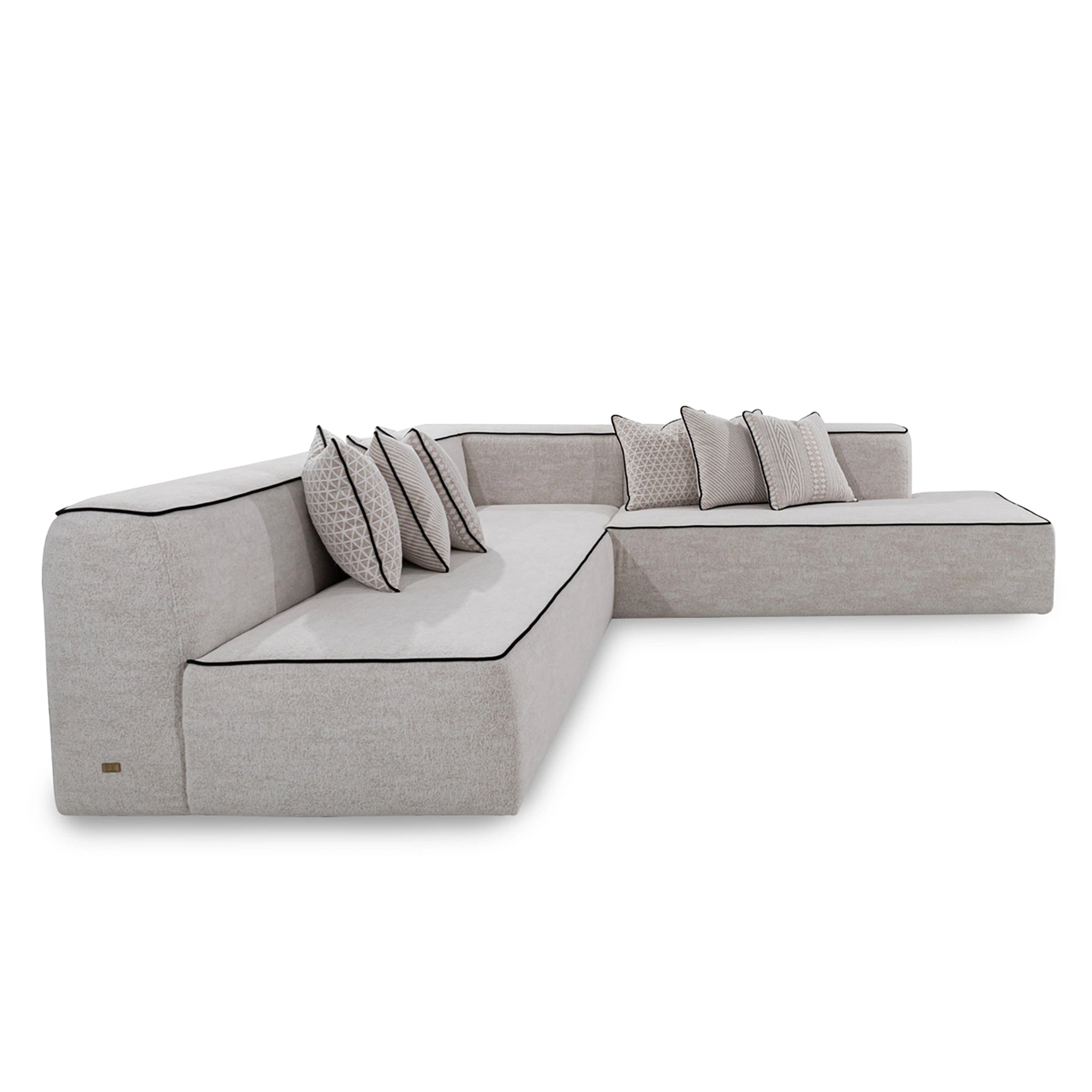 Gray sectional sofa with cushions on a white background