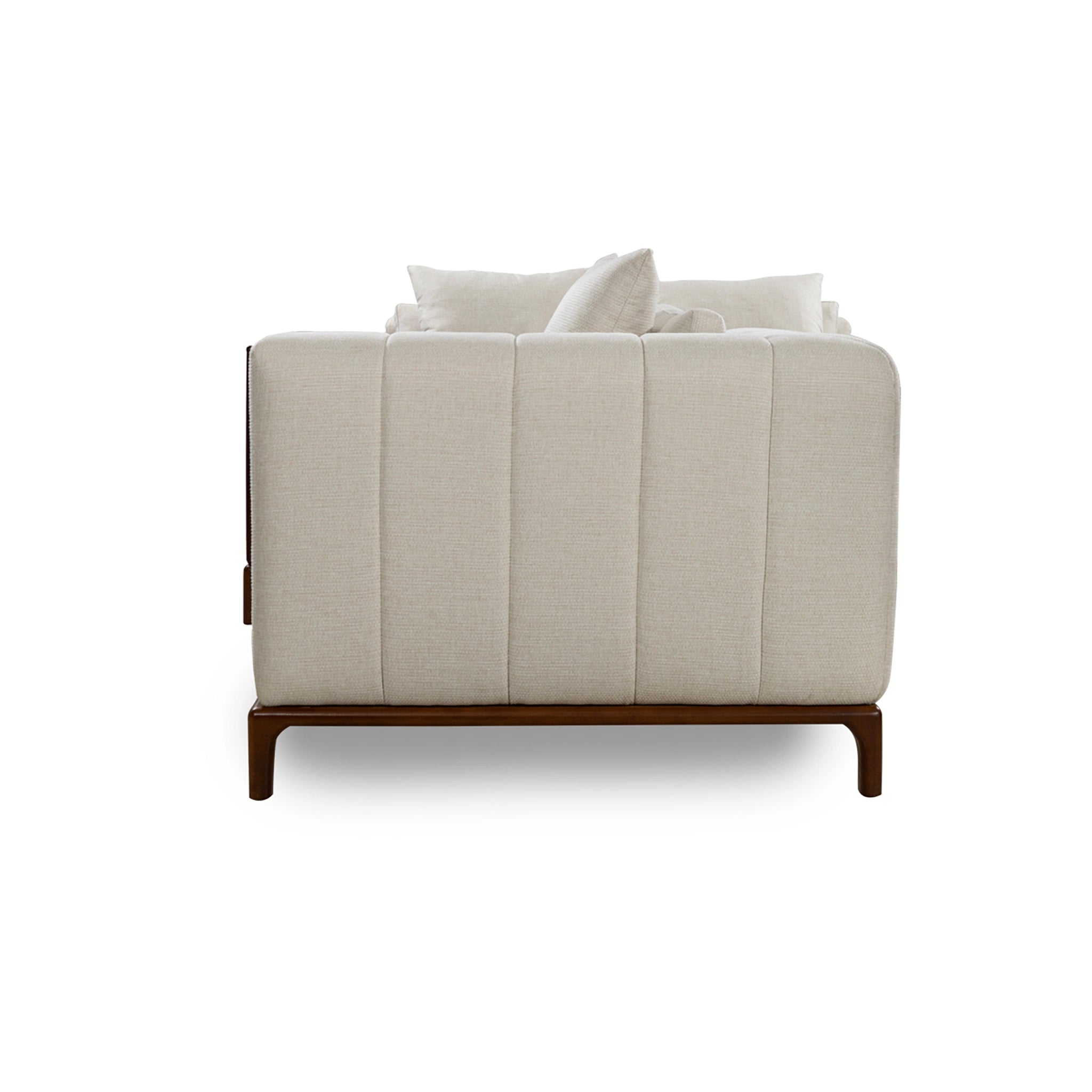 White upholstered chair with wooden legs on a white background