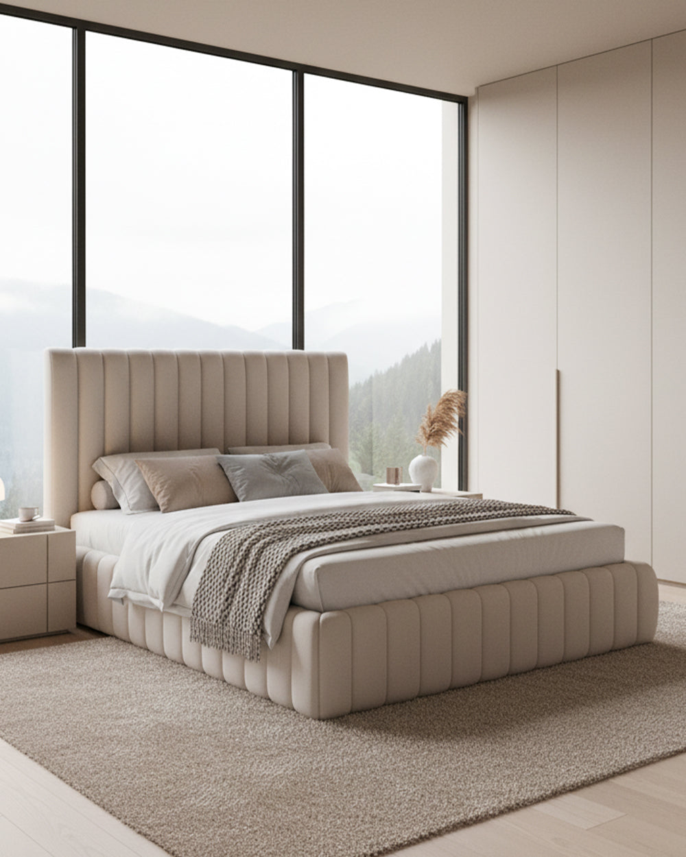 Beige upholstered bed in a modern bedroom with large windows.