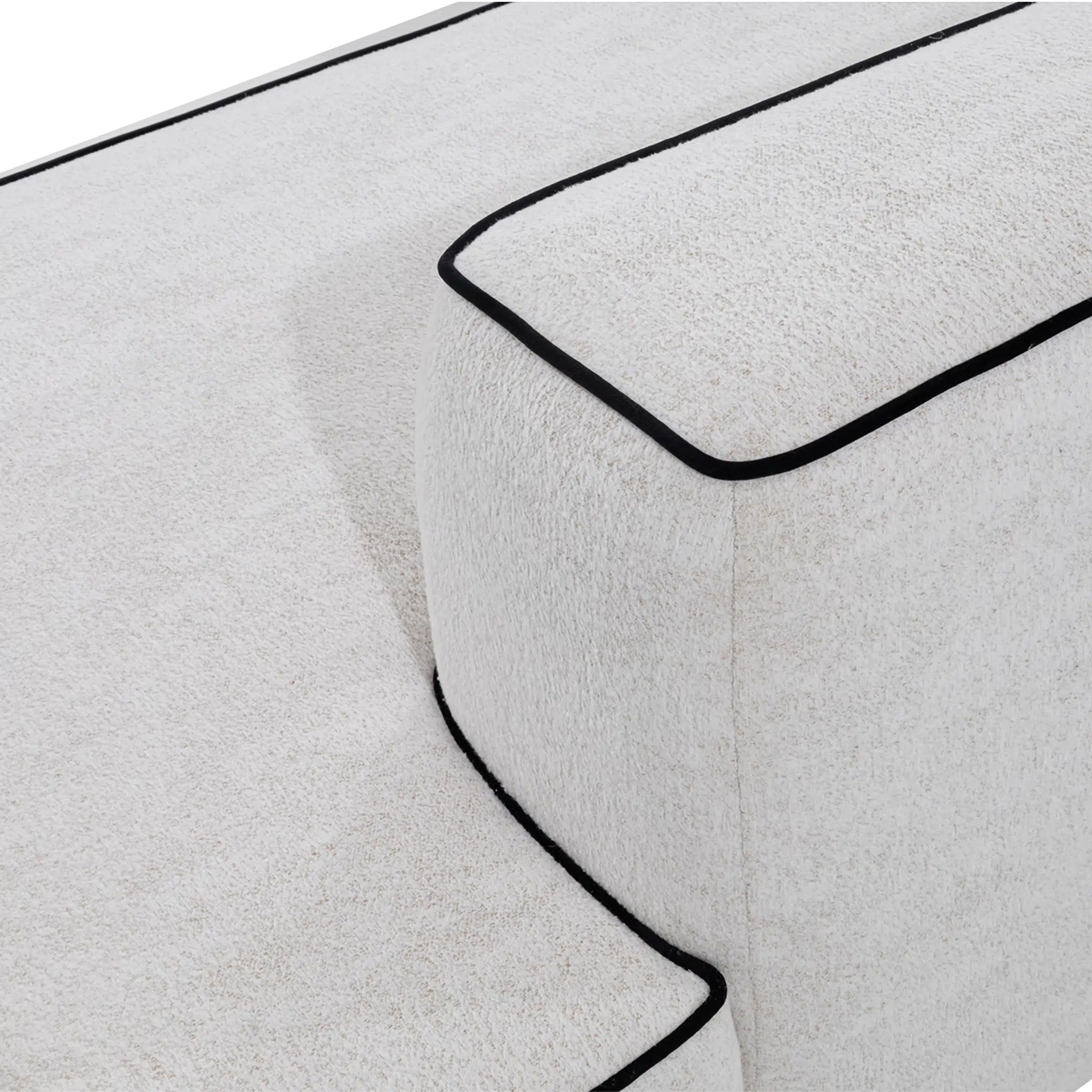 Close-up of a white bath mat with a black border on a white background