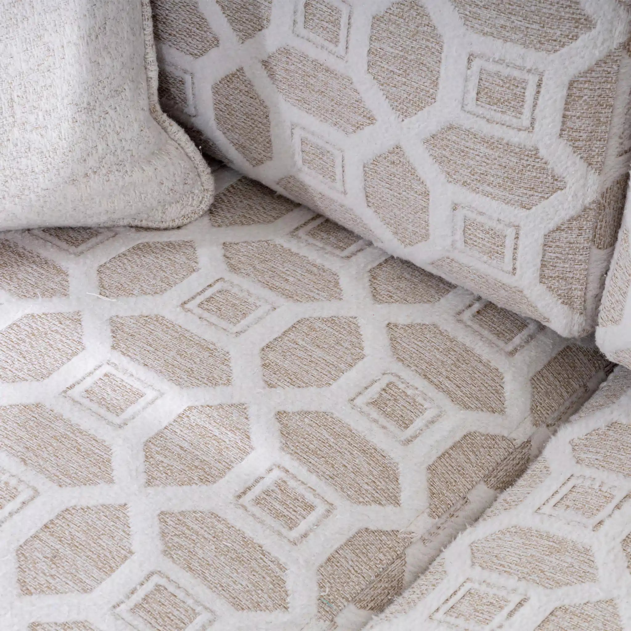 Close-up of textured beige and white patterned fabric