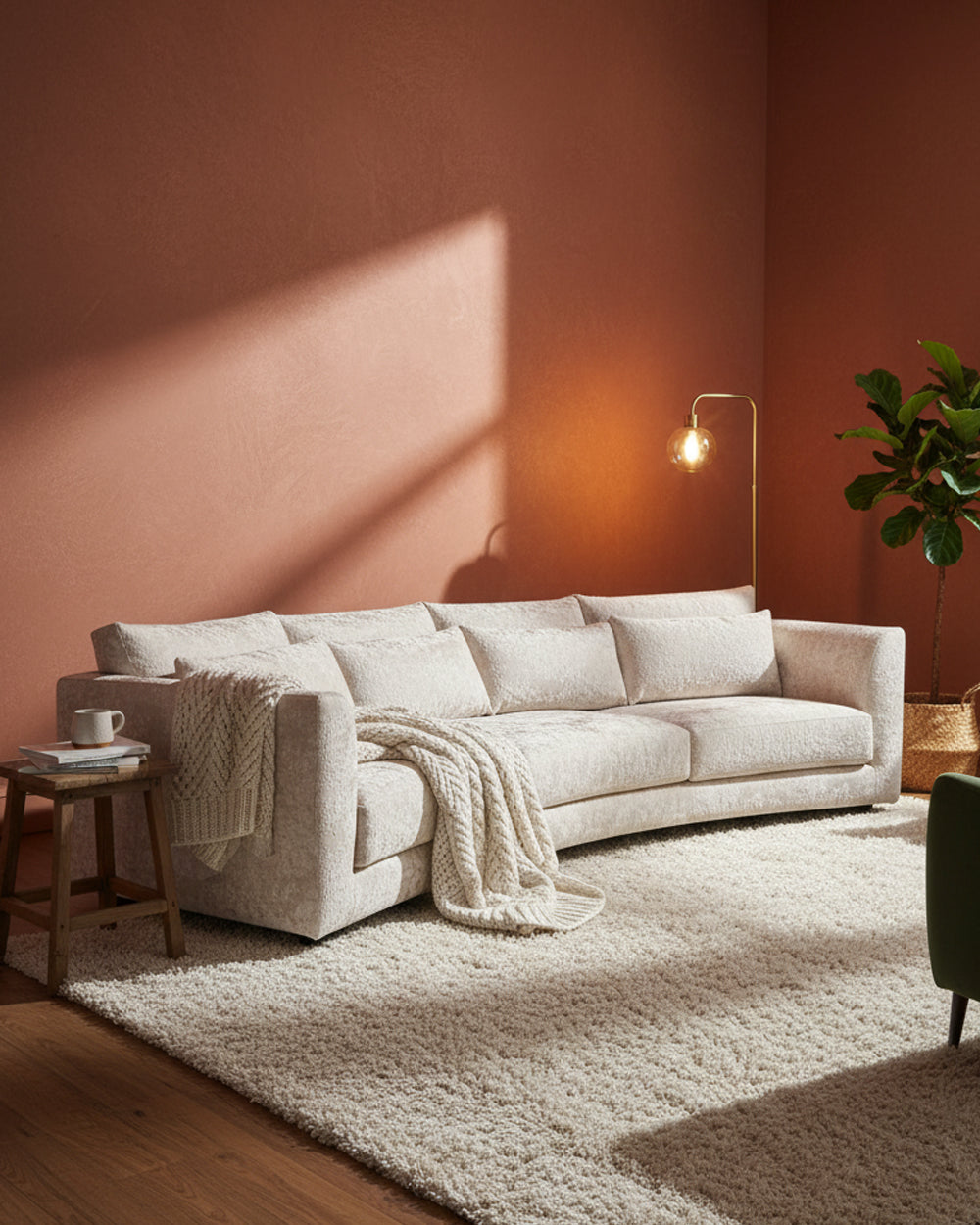 Beige sectional sofa in a living room with a warm color scheme