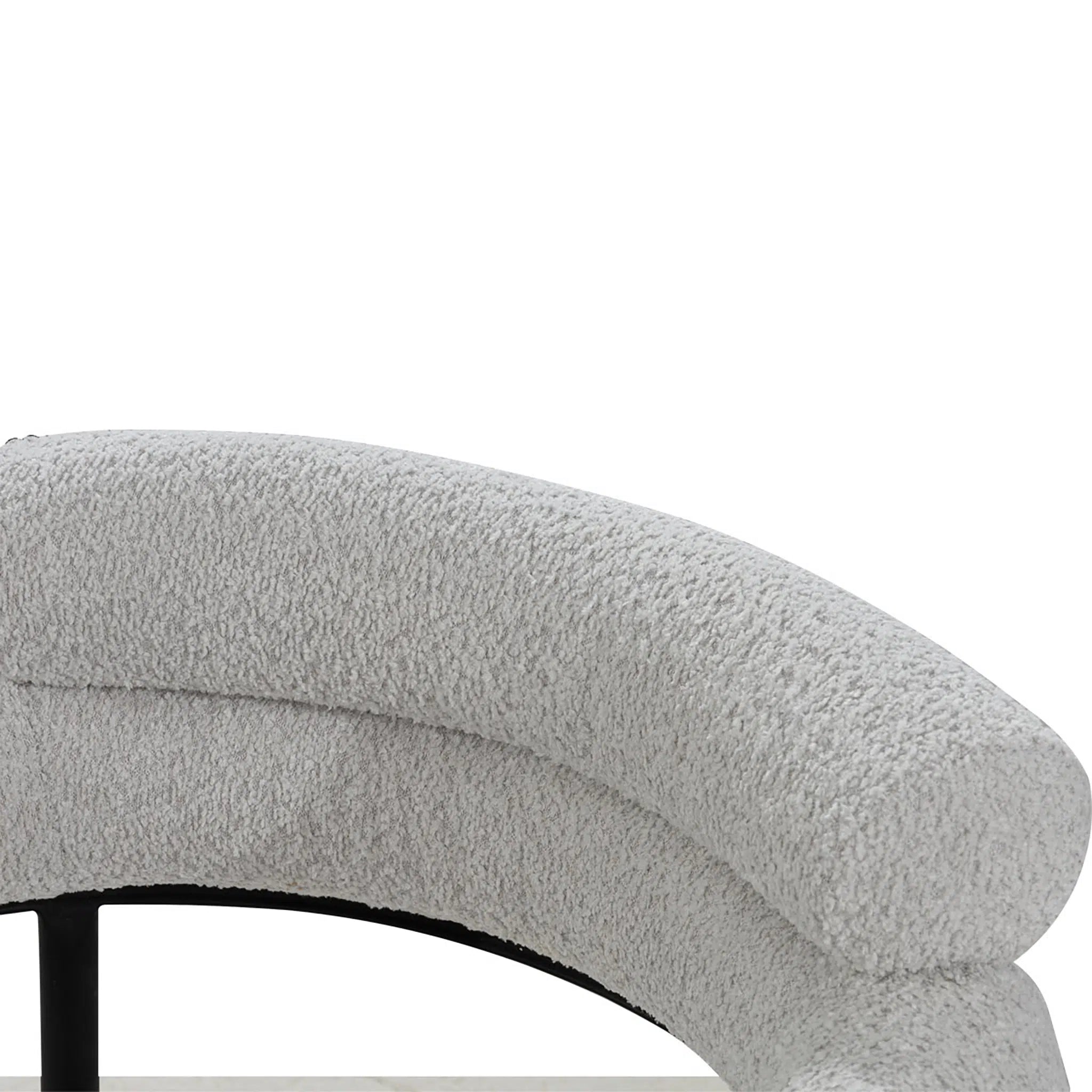 Gray cushioned chair on a white background