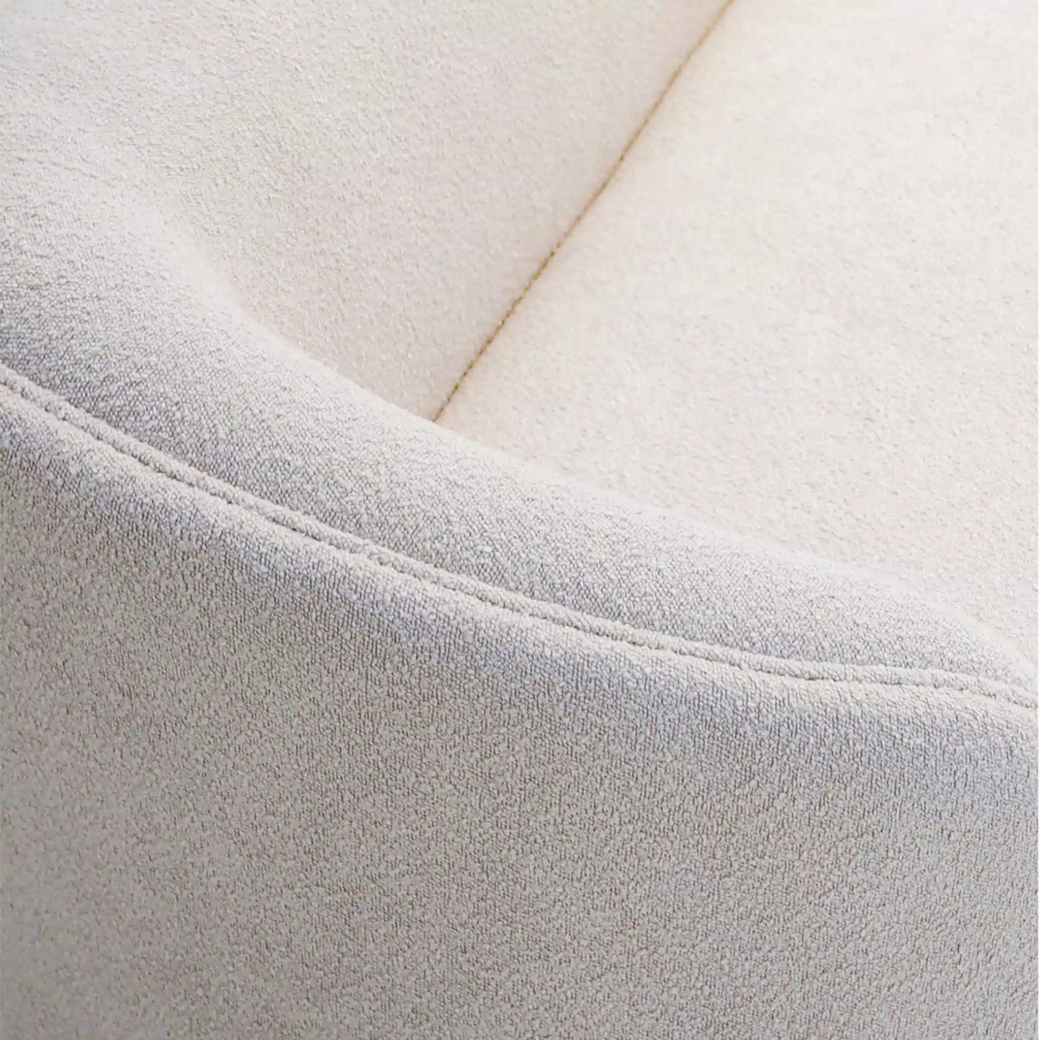Close-up of a textured fabric surface with a subtle pattern.