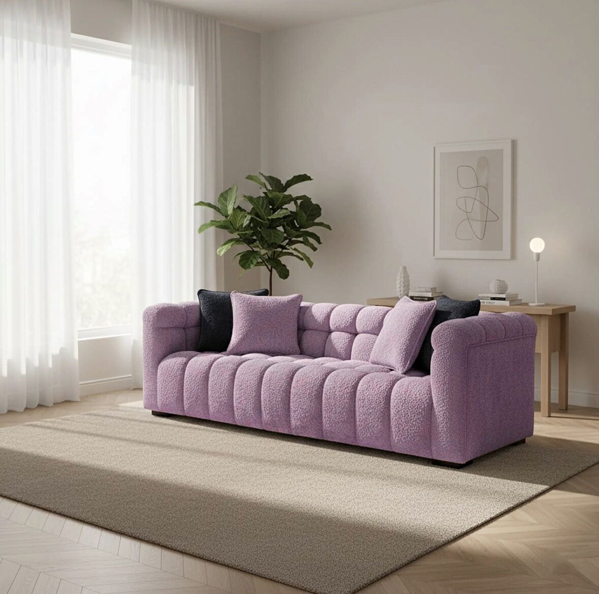 Purple sofa in a living room with a plant and decor items.