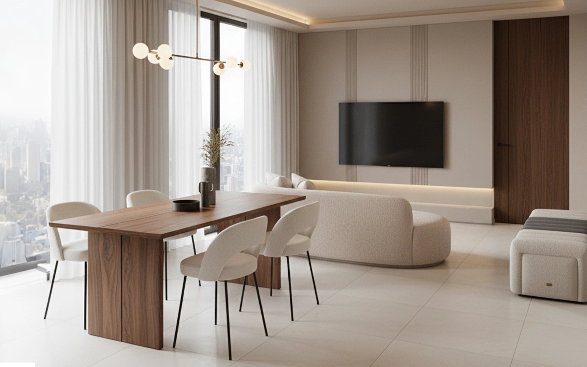 Modern living room with a wooden dining table and white chairs, featuring a television on the wall.
