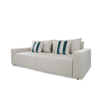 Beige sofa with striped cushions on a white background