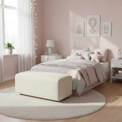 Children's bedroom with pink walls, bed, and decor