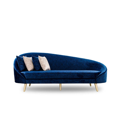 Blue velvet sofa with beige cushions on a white background
