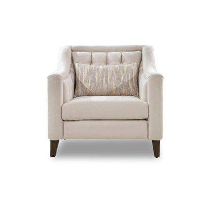 Beige armchair with a patterned pillow on a white background