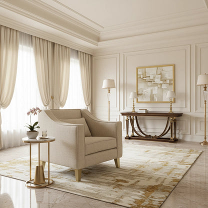 Luxurious living room with beige armchair, side table, and decorative elements.