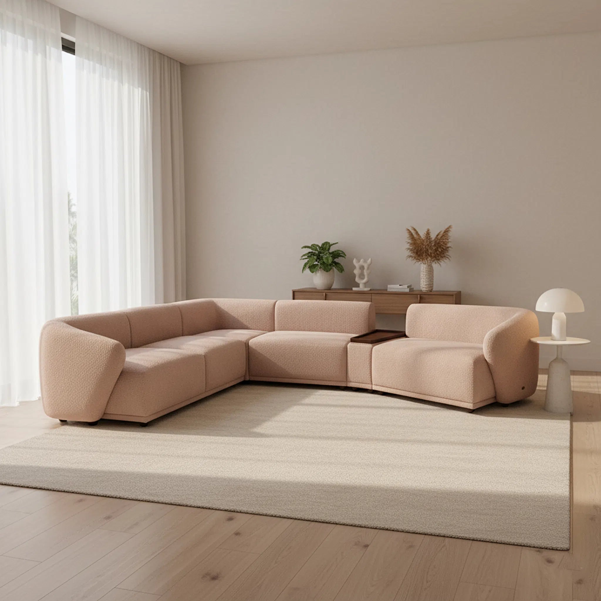 Beige sectional sofa in a modern living room with neutral decor.